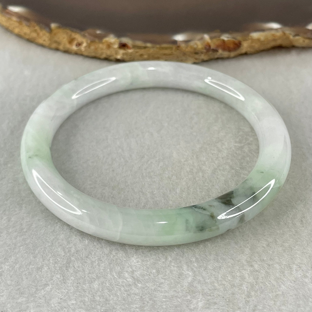 Type A Light Green with Blueish Green piao Hua Floral Jadeite Bangle 37.84g Inner Diameter 57.7mm 8.6 by 9.0mm (Internal Lines) - Huangs Jadeite and Jewelry Pte Ltd