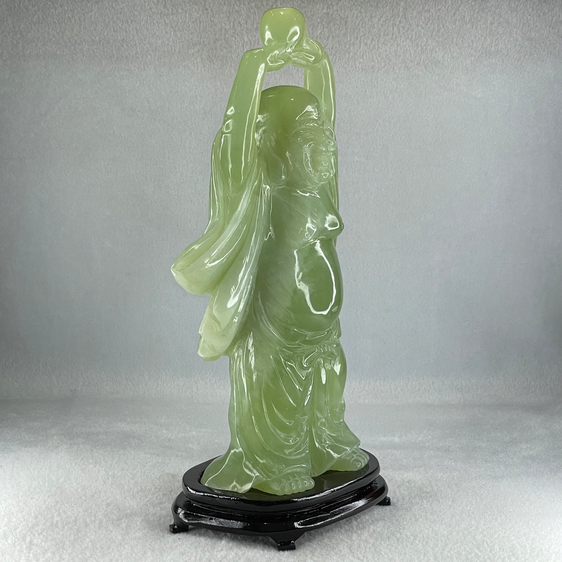 Natural Green Serpentine Stand Laughing Milo Buddha with Wealth Pot with Wooden Stand Display 1,599.3g 140.0 by 90.0 by 270.0mm - Huangs Jadeite and Jewelry Pte Ltd