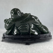 Natural Dark Green Serpentine Laughing Milo Buddha with Wealth Pot with Wooden Stand Display 1,656.6g 190.0 by 133.0 by 127.0mm - Huangs Jadeite and Jewelry Pte Ltd