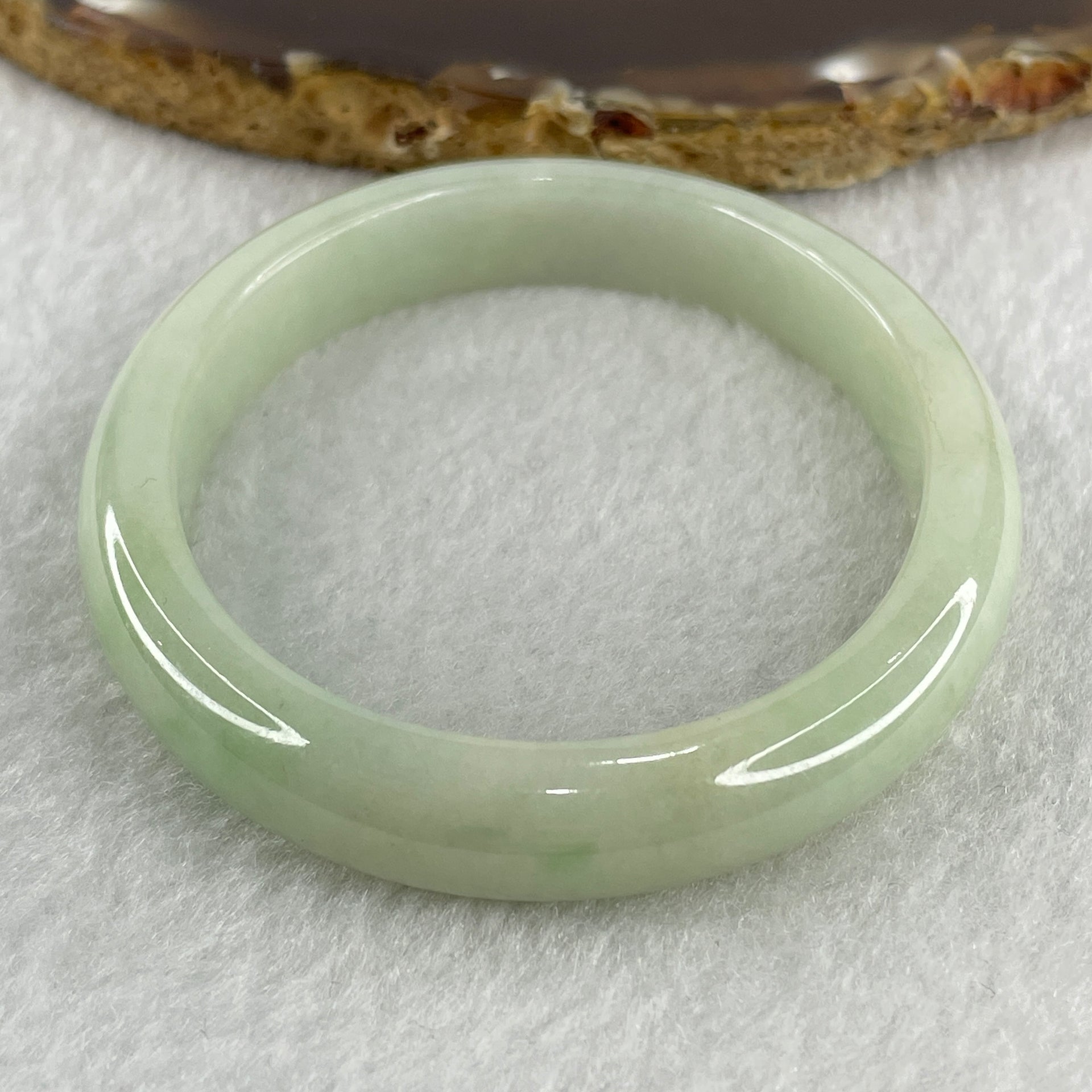 Natural Type A Light Apple Green Jadeite Oval Bangle 32.89g Inner Diameter 55.1mm Thickness 9.9 by 6.8mm (Close to Perfect) - Huangs Jadeite and Jewelry Pte Ltd