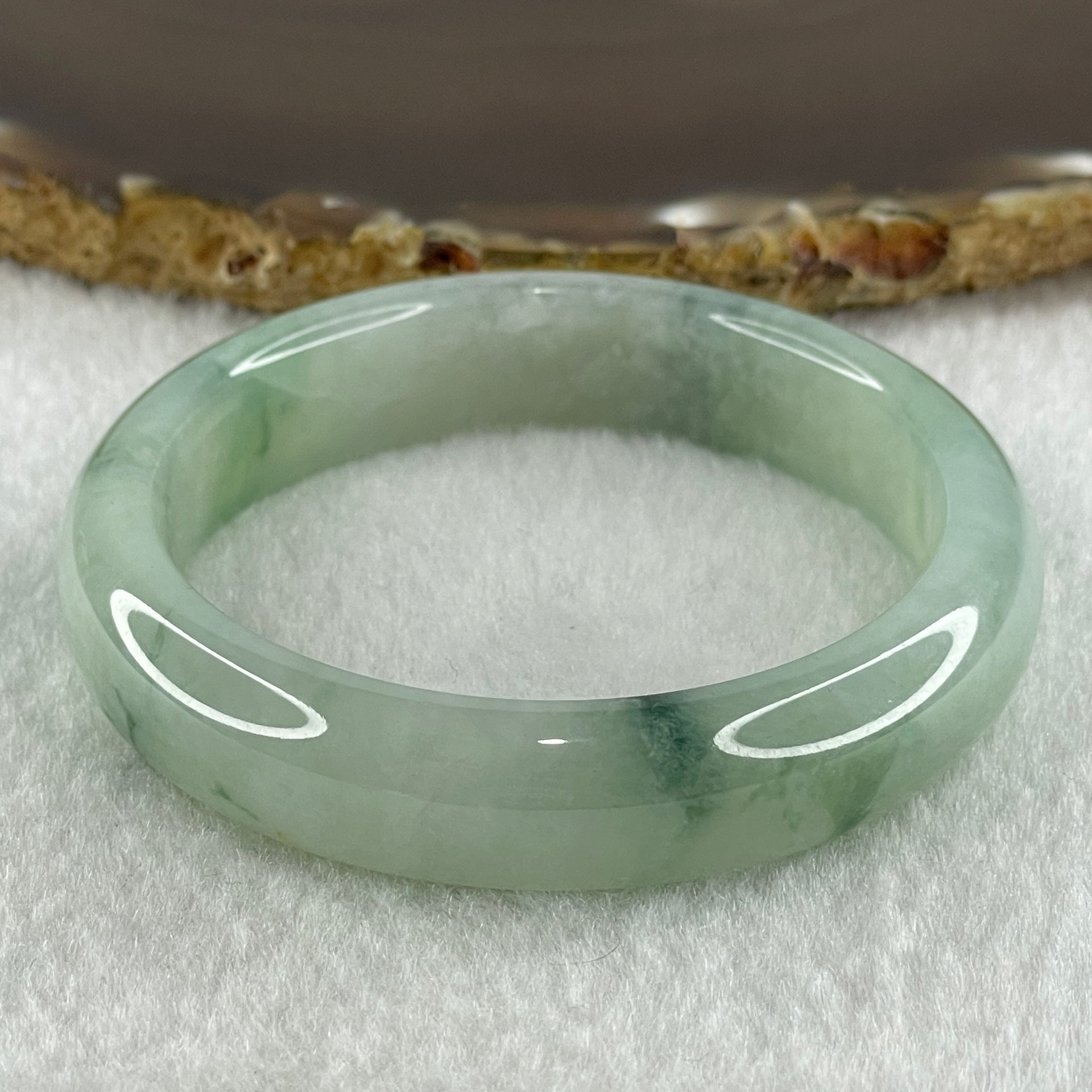 Type A Natural Jelly Light Green with Blueish Green Flora Piao Hua Jadeite Bangle 44.63g Inner Diameter 50.7mm 12.3 by 8.3mm (Internal Lines) - Huangs Jadeite and Jewelry Pte Ltd
