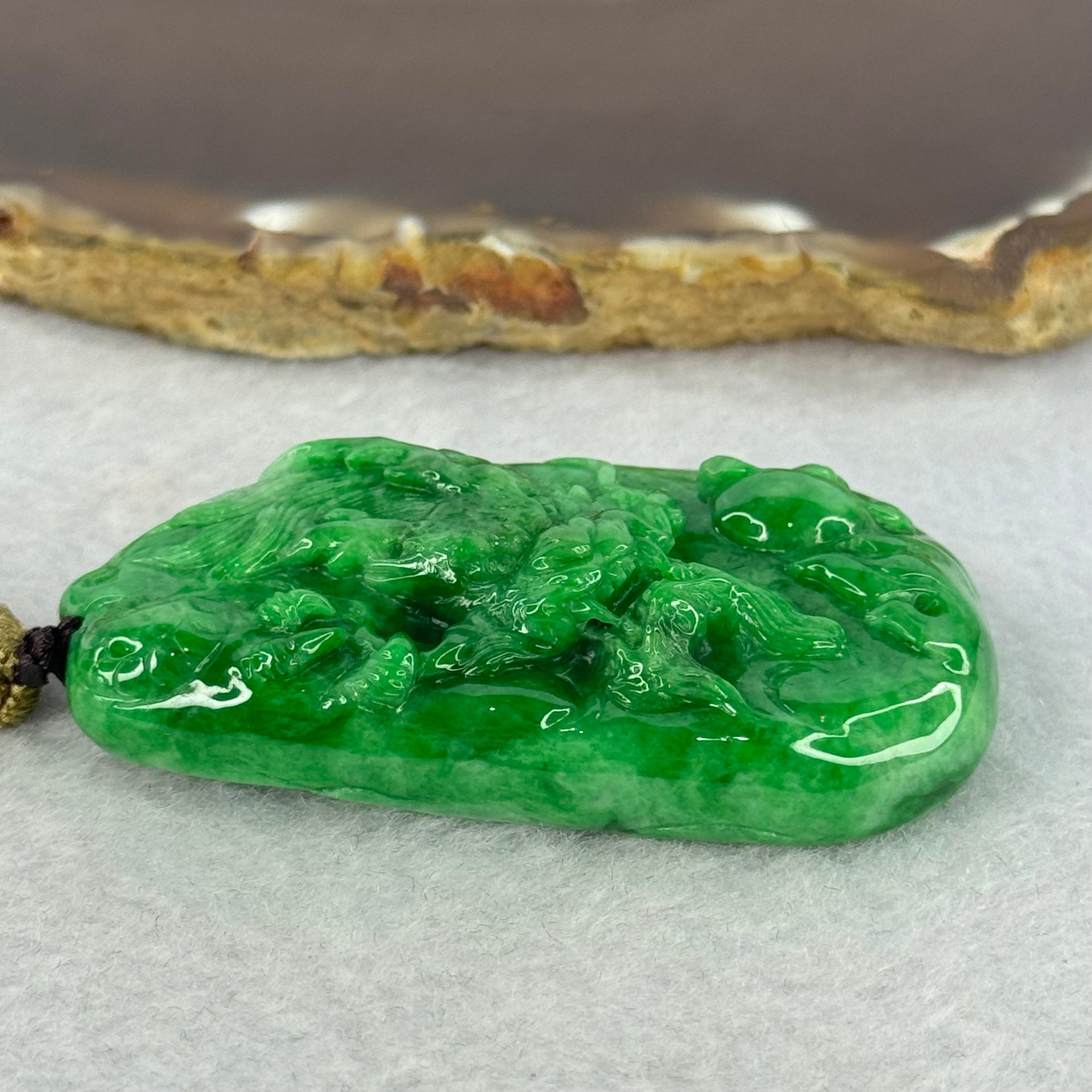 Grand Master Type A Spicy Green Jadeite Dragon 38.59g 54.6 by 31.6 by 11.3mm - Huangs Jadeite and Jewelry Pte Ltd