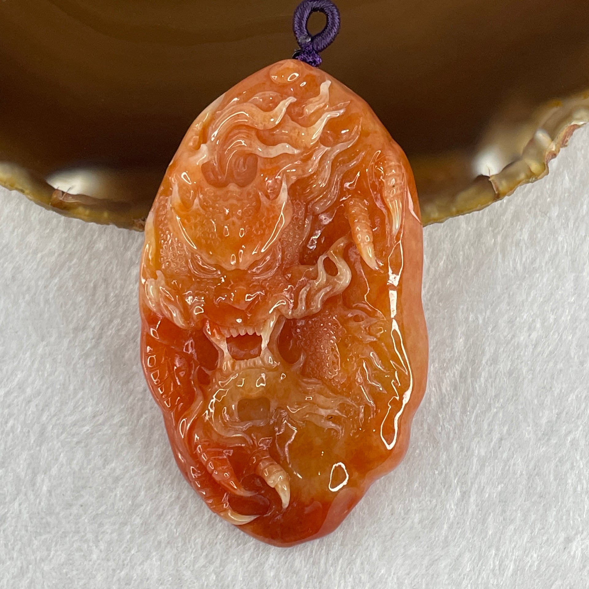 Type A Brownish Red Jadeite Dragon Double Side Pendant 55.34g 66.4 by 39.8 by 12.3mm - Huangs Jadeite and Jewelry Pte Ltd