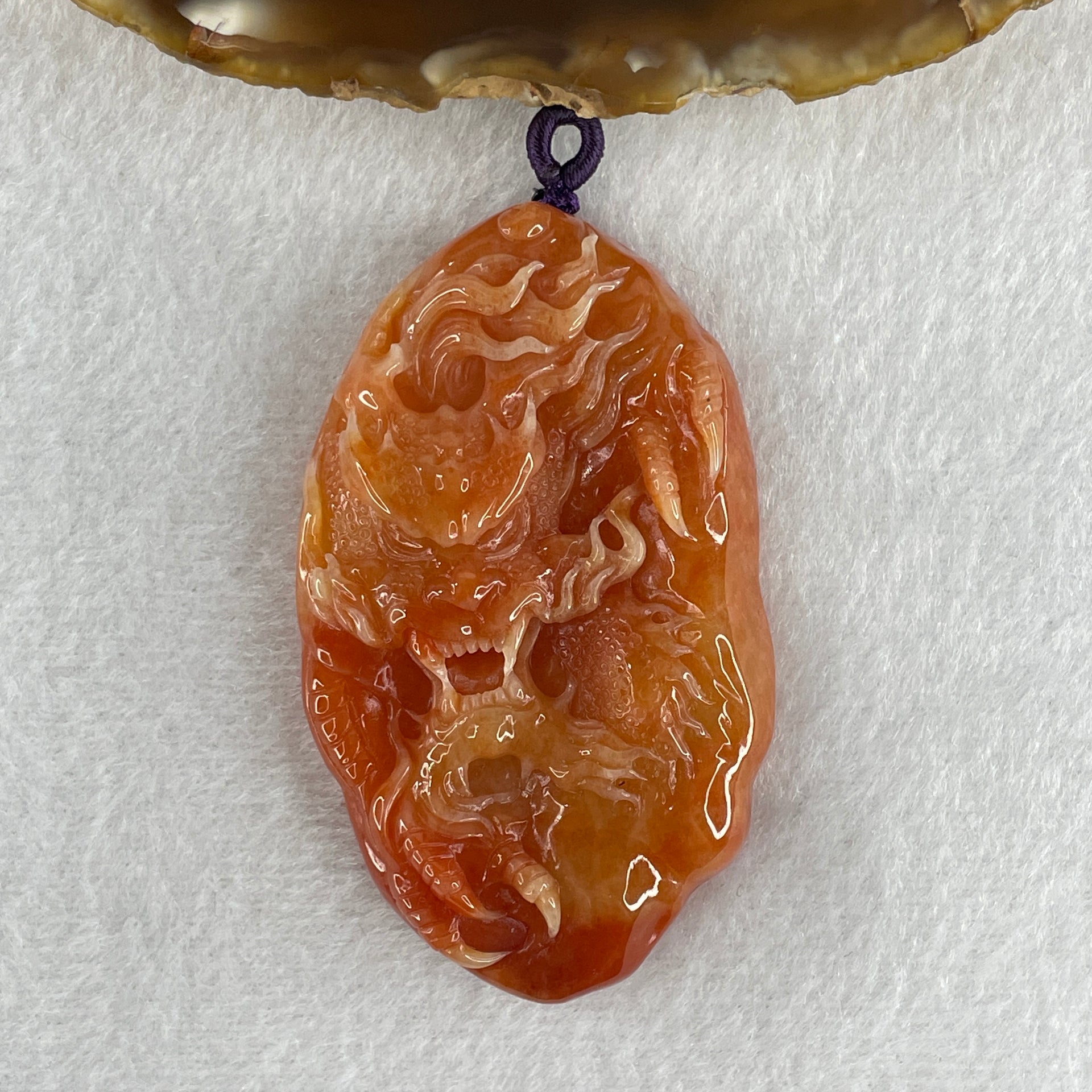 Type A Brownish Red Jadeite Dragon Double Side Pendant 55.34g 66.4 by 39.8 by 12.3mm - Huangs Jadeite and Jewelry Pte Ltd