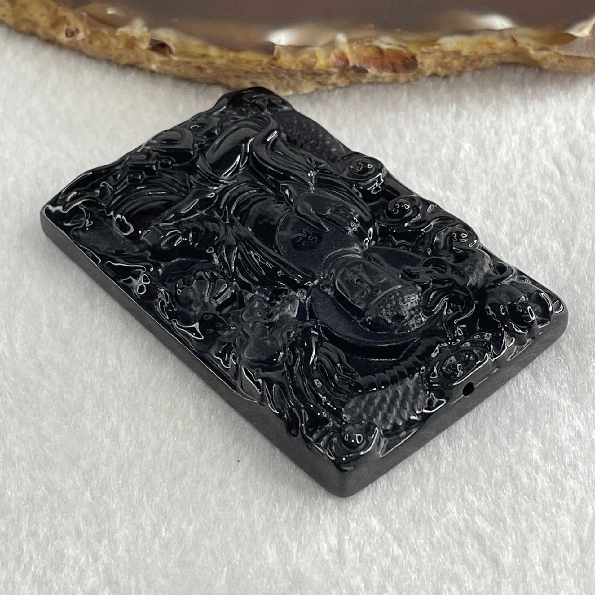 Type A Opaque to Partial Translucent Black Omphacite Jadeite Amitabha Buddha with Dragon Pendant Dog and Boar Pig Zodiac Guardian 37.44g 62.5 by 41.7 by 9.7mm - Huangs Jadeite and Jewelry Pte Ltd