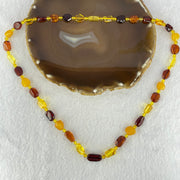 Natural Mixed Color Amber Beads Necklaces 18.16g 60cm 18.8 by 10.2 by 4.8mm, 11.2 by 7.1 by 5.5mm 35pcs - Huangs Jadeite and Jewelry Pte Ltd