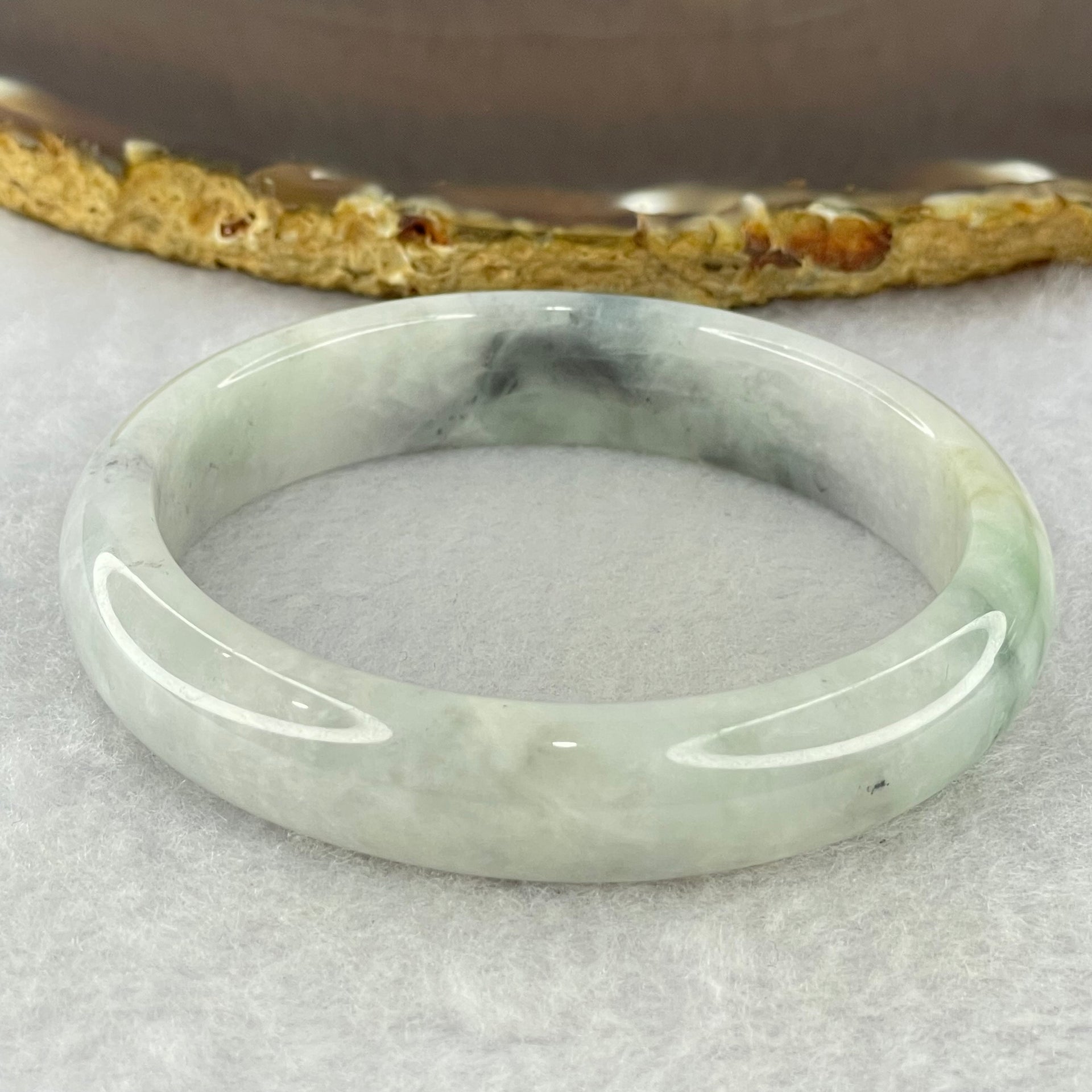 Type A Lavender Green with Grey Wuji Piao Hua Jadeite Oval Bangle Internal Diameter 56.0mm 44.31g 12.7 by 7.7mm (Slight Internal Lines) - Huangs Jadeite and Jewelry Pte Ltd