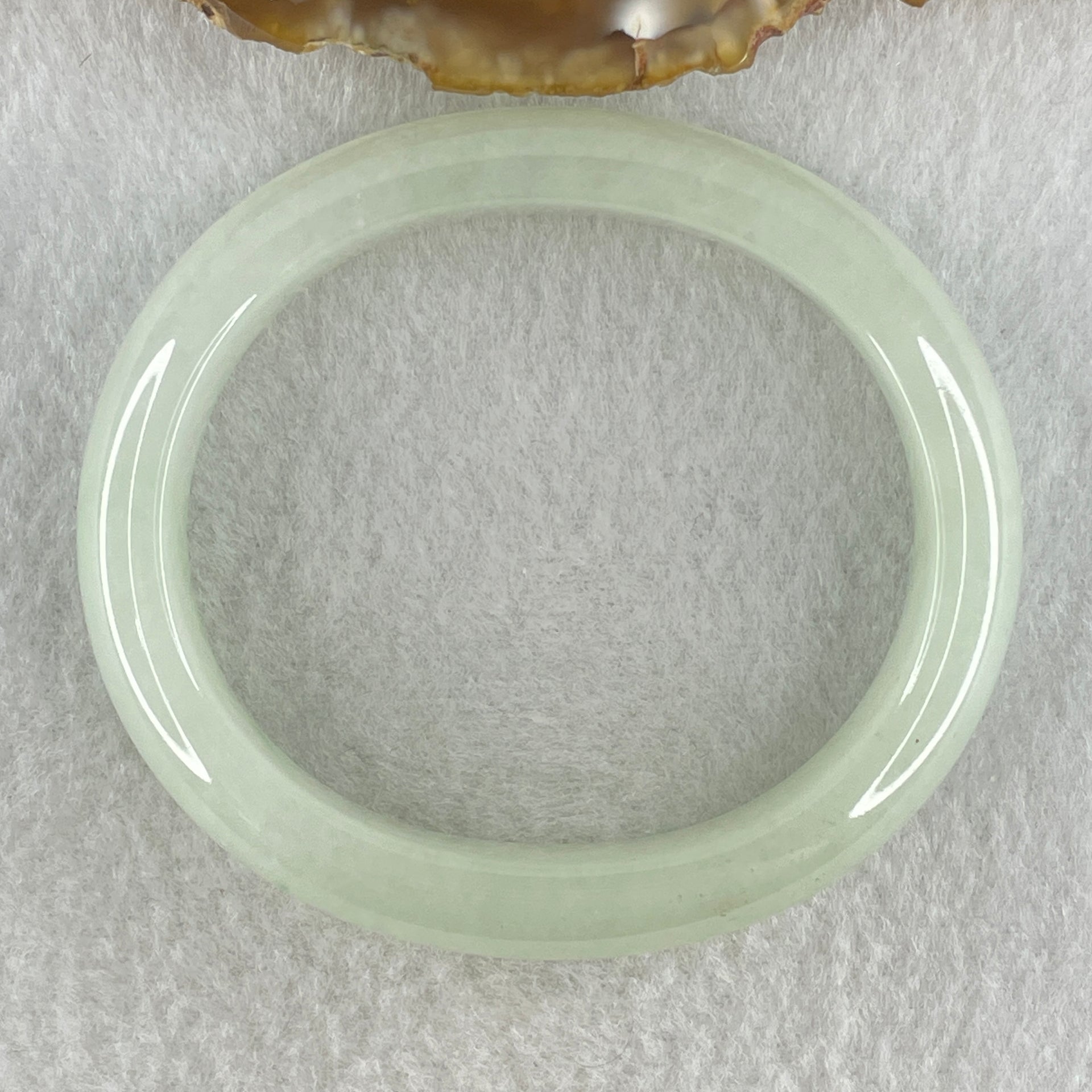 Type A Natural Jelly Light Green Jadeite Oval Bangle 47.17g Inner Diameter 54.6mm 12.3 by 8.2mm (Internal Line) - Huangs Jadeite and Jewelry Pte Ltd