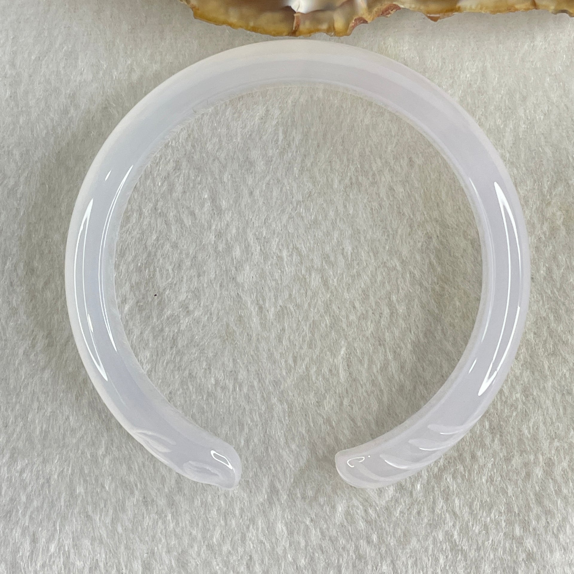 Natural Pinky Agate Fox Bange Internal Dimeter 57.3mm 26.43g 10.2 by 7.6mm - Huangs Jadeite and Jewelry Pte Ltd