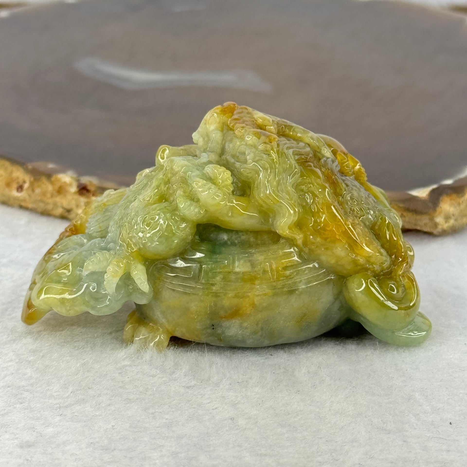 Grand Master Type A Blueish Green with Brownish Yellow Jadeite Dragon on Wealth Pot with Treasures 133.13g 36.0 by 69.3 by 39.5mm - Huangs Jadeite and Jewelry Pte Ltd