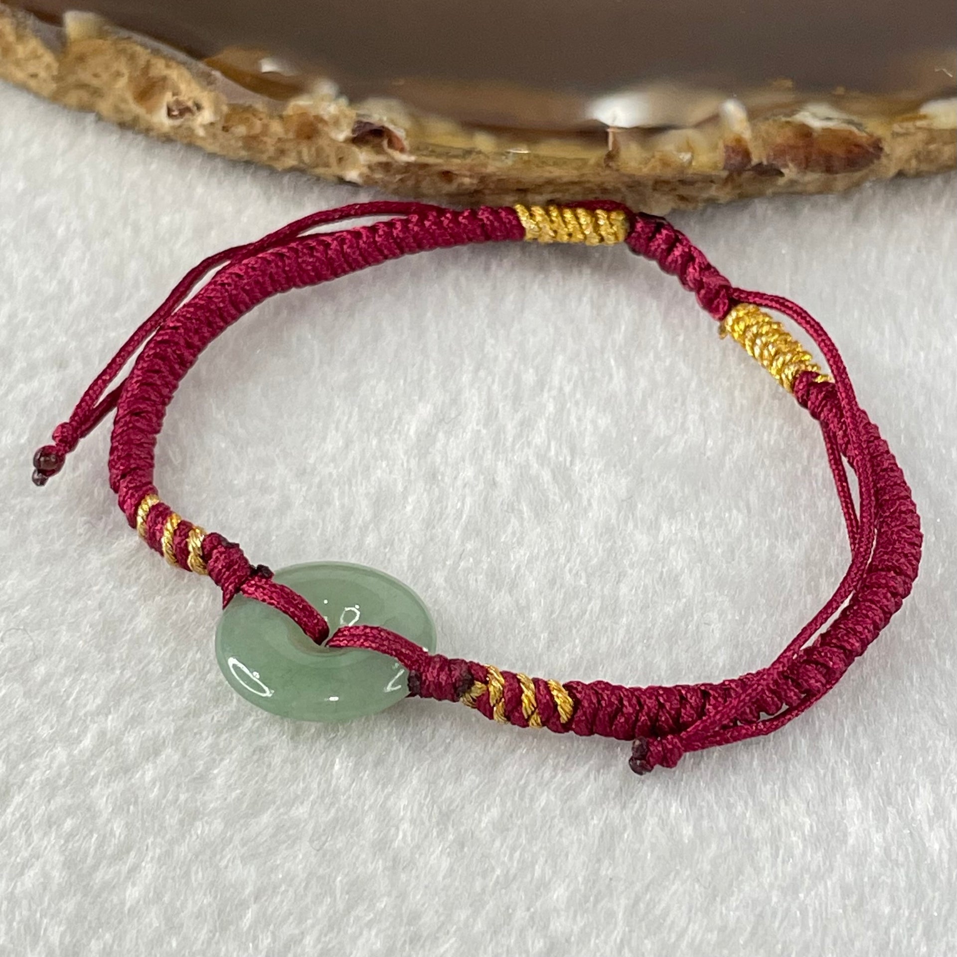 Type A Blueish Green Jadeite Ping An Kou Donut In String Bracelet 2.16g 14.4 by 3.5mm - Huangs Jadeite and Jewelry Pte Ltd