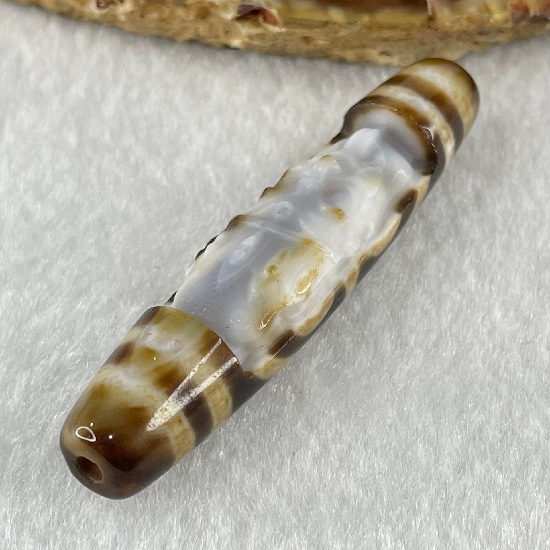Natural Powerful Tibetan Old Oily Agate Zha Ji La Mu Female Cai Shen and 8 Eyes Dzi Bead Heavenly Master (Tian Zhu) 扎基拉姆女财神八眼天珠 12.91g 57.4 by 12.9mm - Huangs Jadeite and Jewelry Pte Ltd