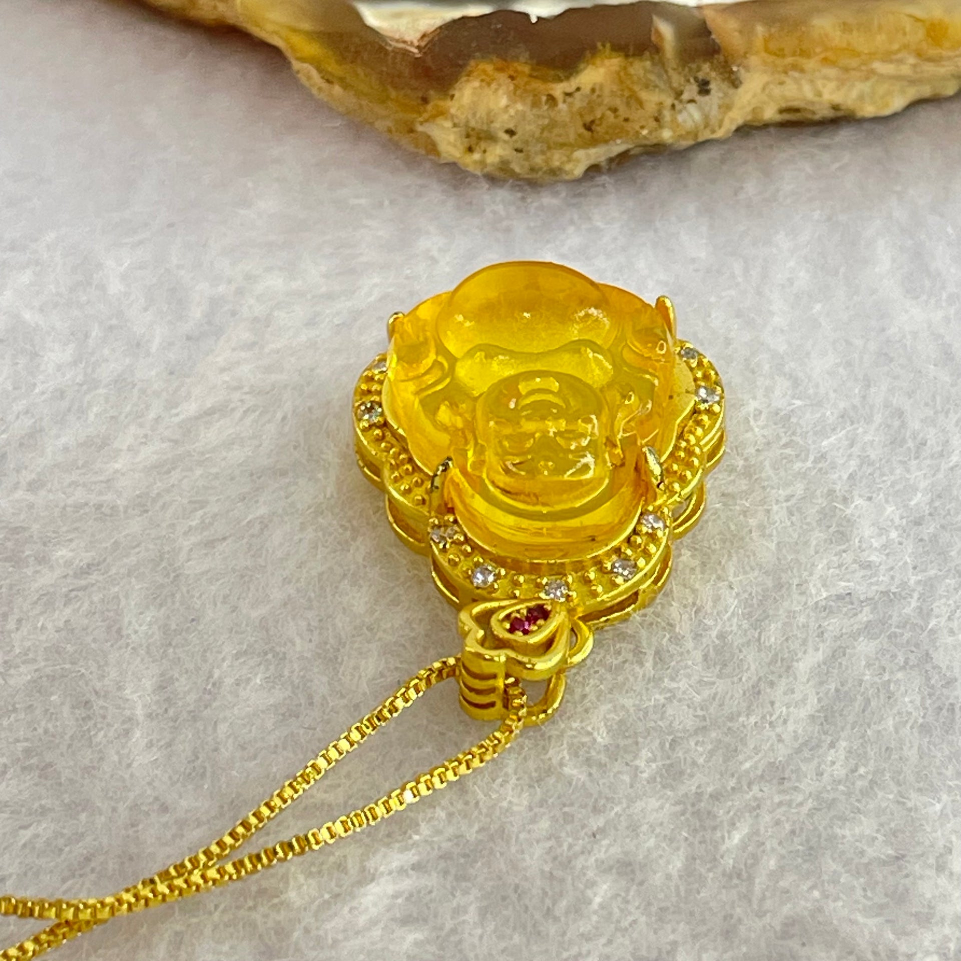 Natural Yellow Amber Milo Buddha Pendent in Gold Color Silver Necklace 4.44g 15.7 by 14.3 by 5.0mm - Huangs Jadeite and Jewelry Pte Ltd