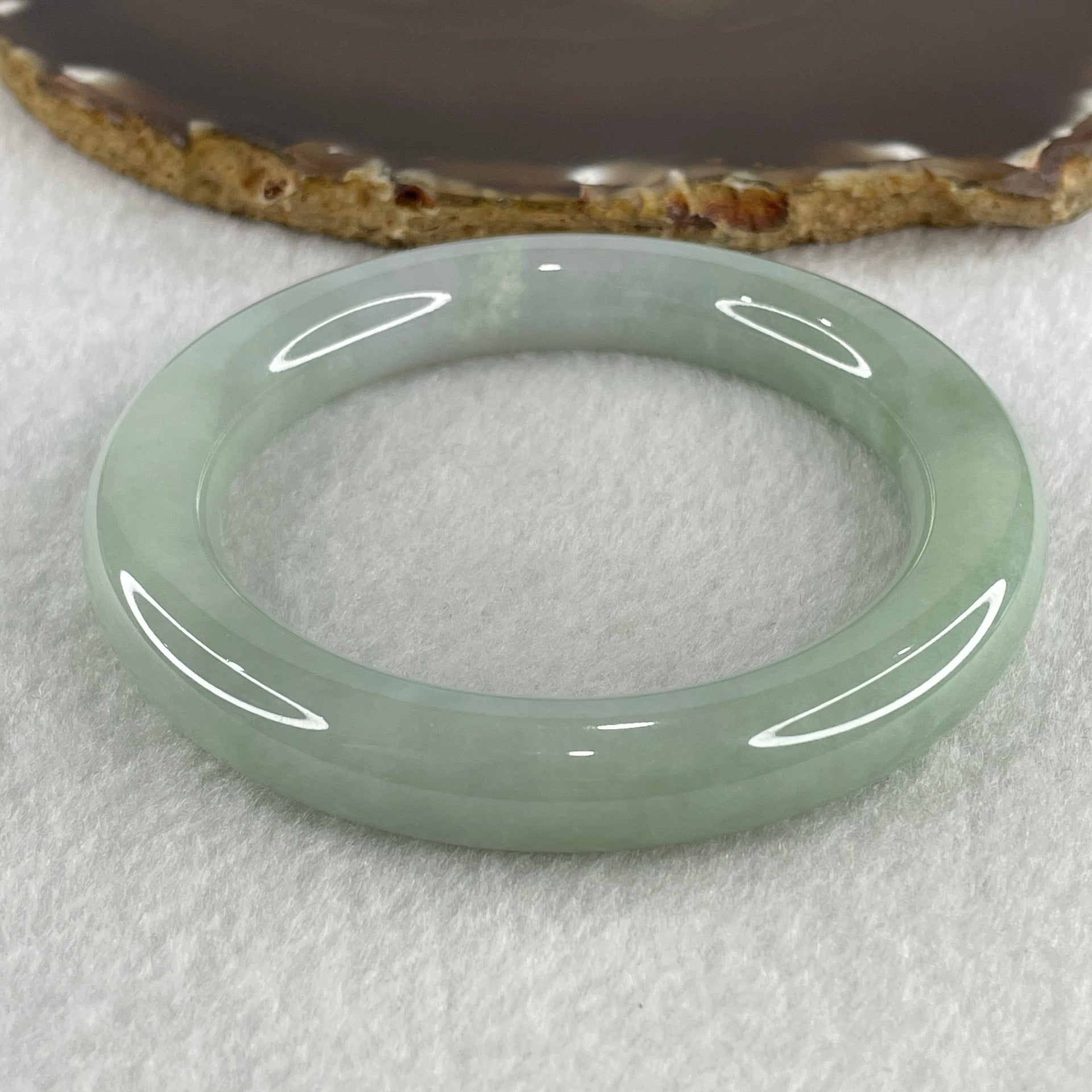 Type A Natural Jelly Light Green with Faint Lavender Jadeite Bangle 74.36g Inner Diameter 59.2mm 11.3 by 11.9mm (Close to Perfect) - Huangs Jadeite and Jewelry Pte Ltd