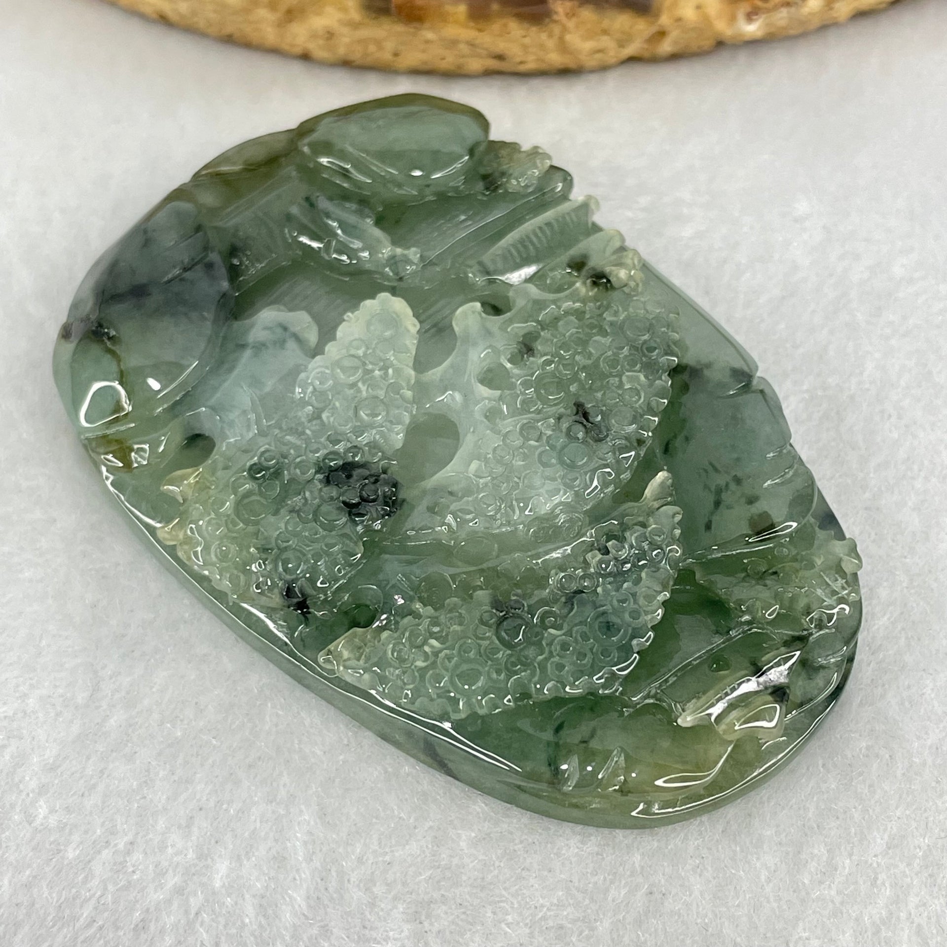 Type A Semi Icy Green with Dark Green Piao Hua Jadeite Shan Shui Gui Ren Benefactor Pendant 53.05g 59.6 by 40.3 by 10.7mm - Huangs Jadeite and Jewelry Pte Ltd