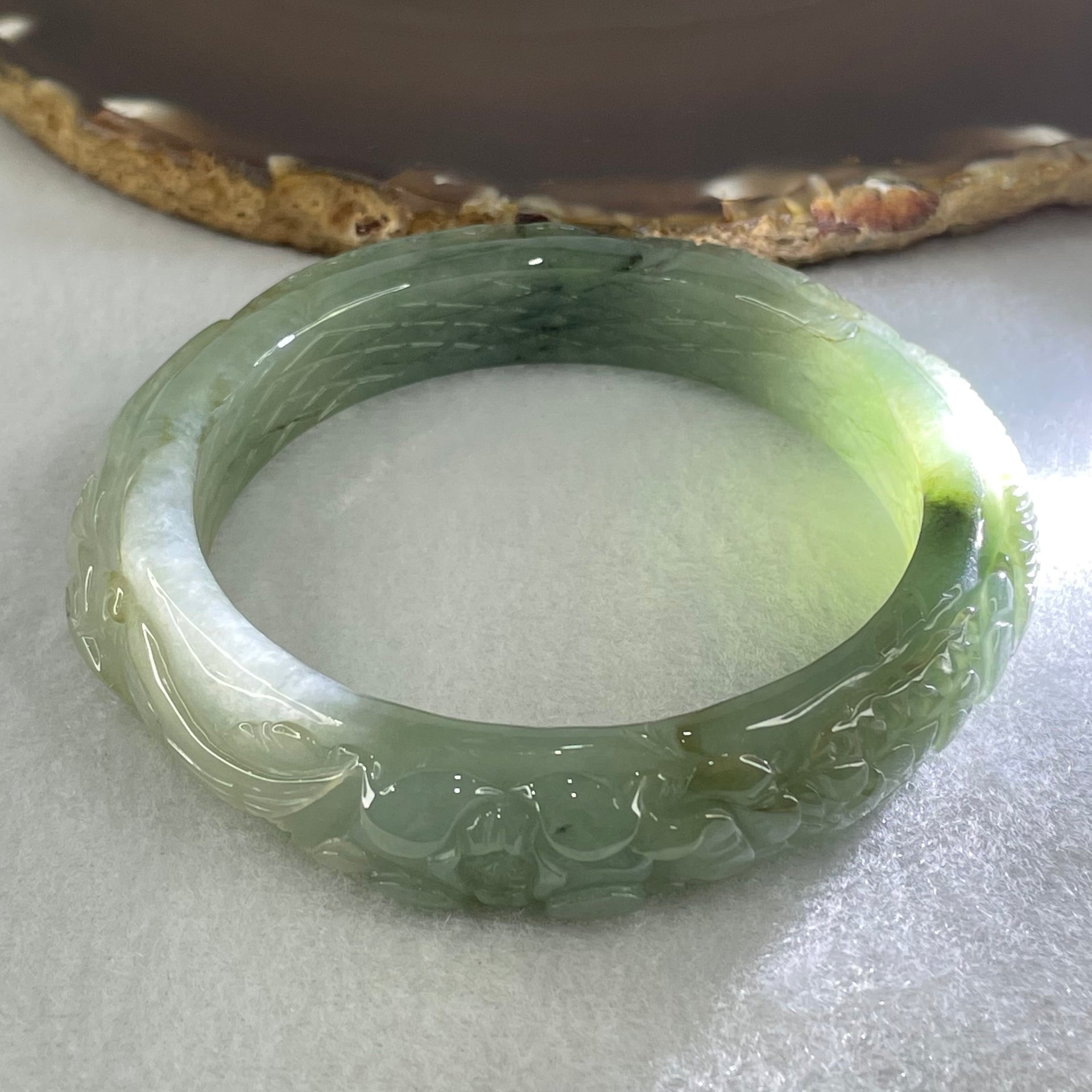 Type A Blueish Green Jadeite Phoenix with Prosperity Flowers Bangle Inner Diameter 57.2mm 12.4 by 10.6mm and Pendant 55.6 by 12.4mm Total Weight 124.77g - Huangs Jadeite and Jewelry Pte Ltd