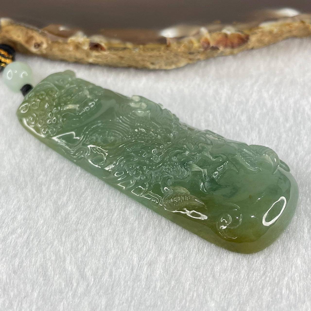 Grandmaster Type A Icy Blueish Green Jadeite Fu Gou on Dragon Pendant 30.95g 68 by 25 by 9.3mm - Huangs Jadeite and Jewelry Pte Ltd