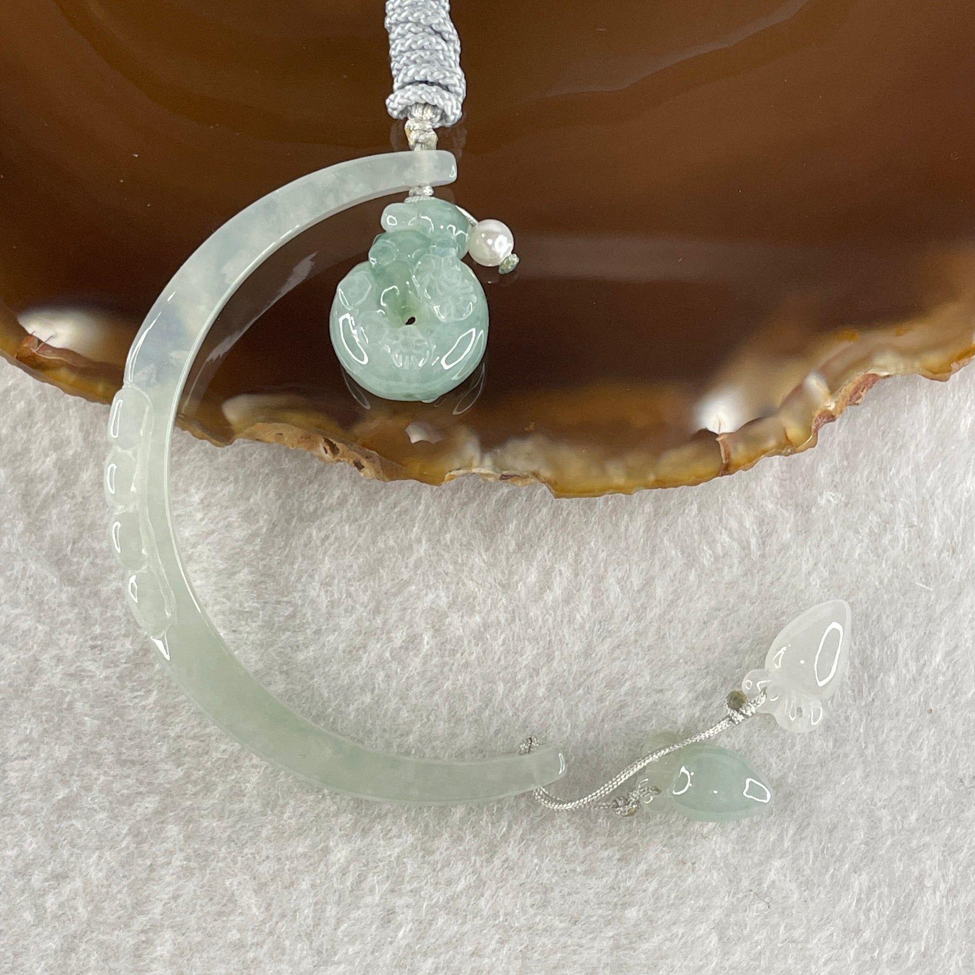 Natural Type A Semi Icy Light Green Jadeite Moon with Rabbit and Flower on Ping An Kou and Carrot Necklace 11.72g 17.2 by 13.6 by 8.6mm Ping An Kou - 56.7 by 4.4 by 5.5mm Moon - Huangs Jadeite and Jewelry Pte Ltd