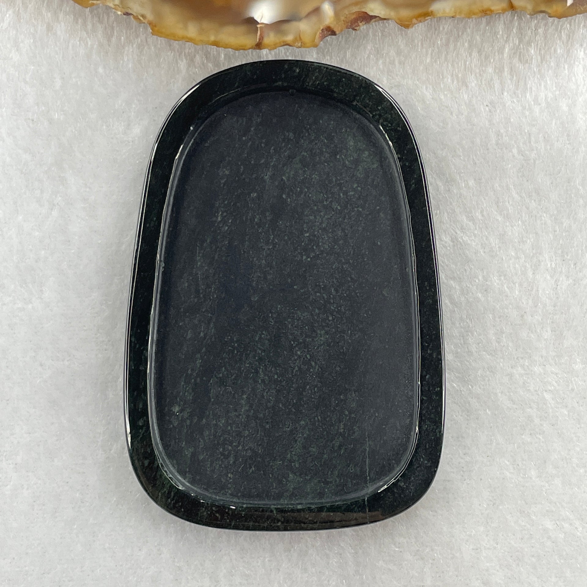 Type A Opaque to Partial Translucent Black Omphacite Jadeite Dragon Pendant 34.19g 66.8 by 45.5 by 9.4mm - Huangs Jadeite and Jewelry Pte Ltd