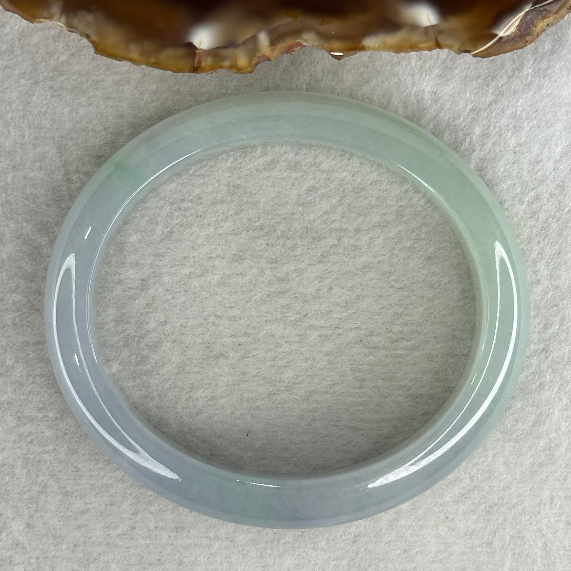 Type A Jelly Faint Green Faint Lavender Jadeite Oval Bangle 48.77g Inner Diameter 57.7mm 12.1 by 8.0mm with NGI Cert No. 32888362 (Internal Line) - Huangs Jadeite and Jewelry Pte Ltd