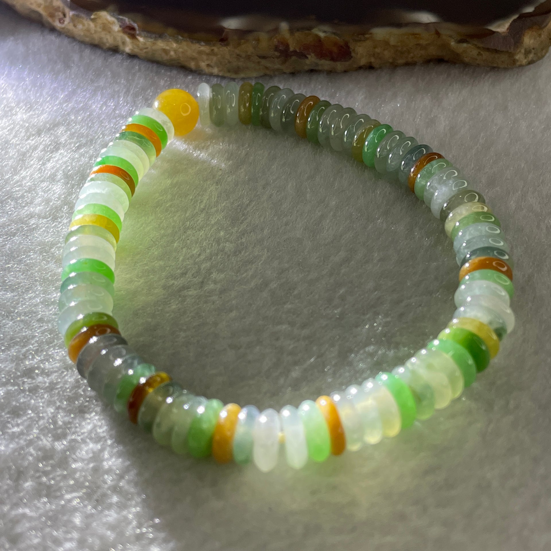 Natural Type A Muti Color Green with Yellow Blueish Green Colorless Jadeite Donut Beads Bracelet 19.89g 16cm 7.1mm 80 Pcs - Huangs Jadeite and Jewelry Pte Ltd