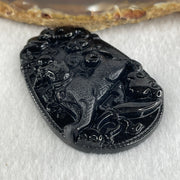 Type A Opaque to Partial Translucent Black Omphacite Jadeite Dog Pendant 23.89g 59.8 by 39.8 by 8.6mm - Huangs Jadeite and Jewelry Pte Ltd