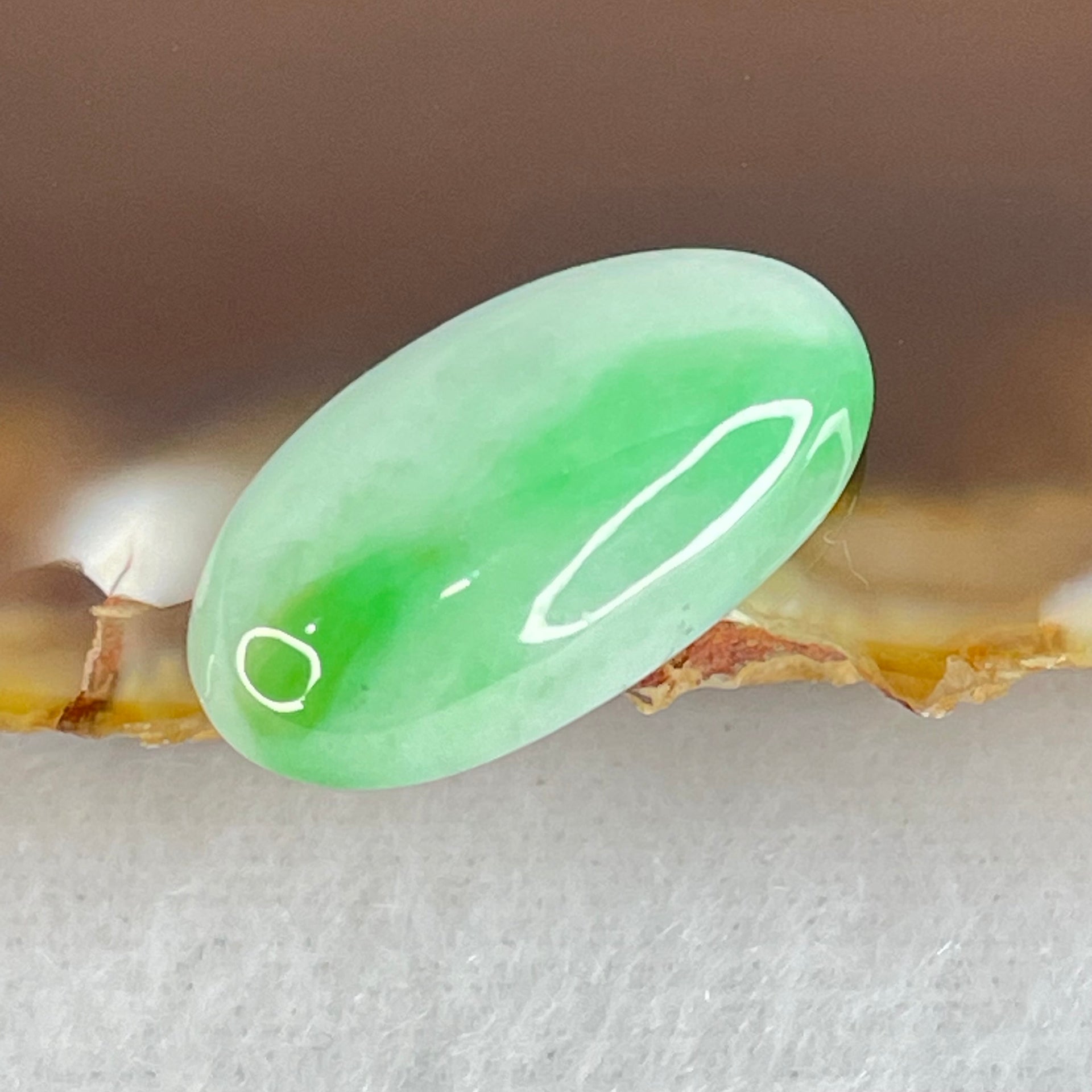 Type A Faint to Bright Apple Green Jadeite Oval Cabouchon Stone For Setting 2.34g 19.3 by 10.6 by 6.2mm - Huangs Jadeite and Jewelry Pte Ltd