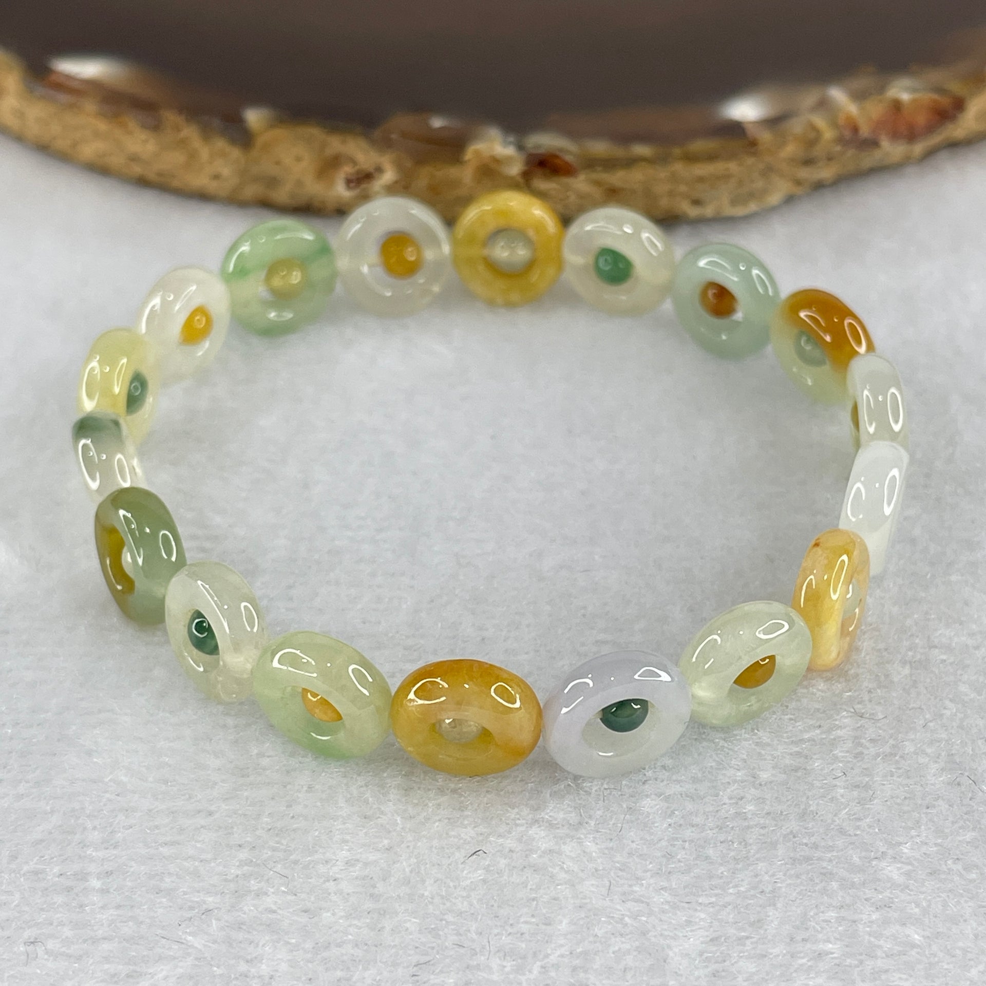 Natural Type A Muti Green with Lavender Yellowish Jadeite Donut Bracelet 12.17g 15.5cm 9.9 by 3.2mm 18 Ping An Kow - Huangs Jadeite and Jewelry Pte Ltd
