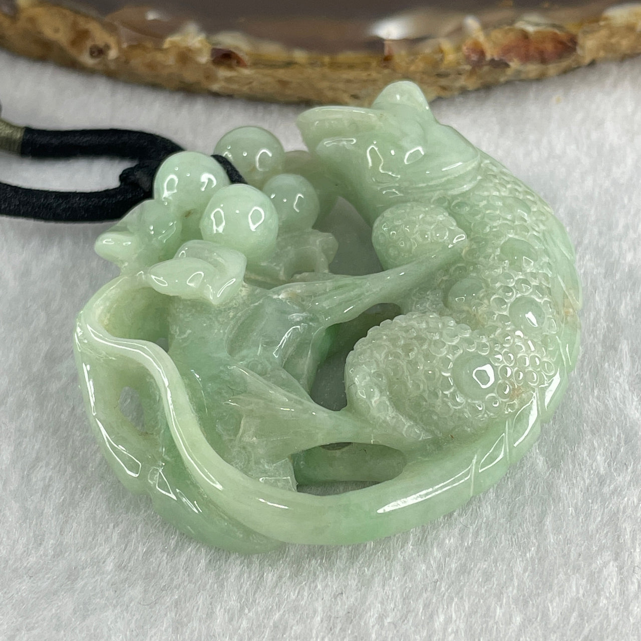 Natural Type A Light Green Jadeite Iguana Lizard on Plant Pendant 46.55g 49.7 by 51.1 by 13.9mm