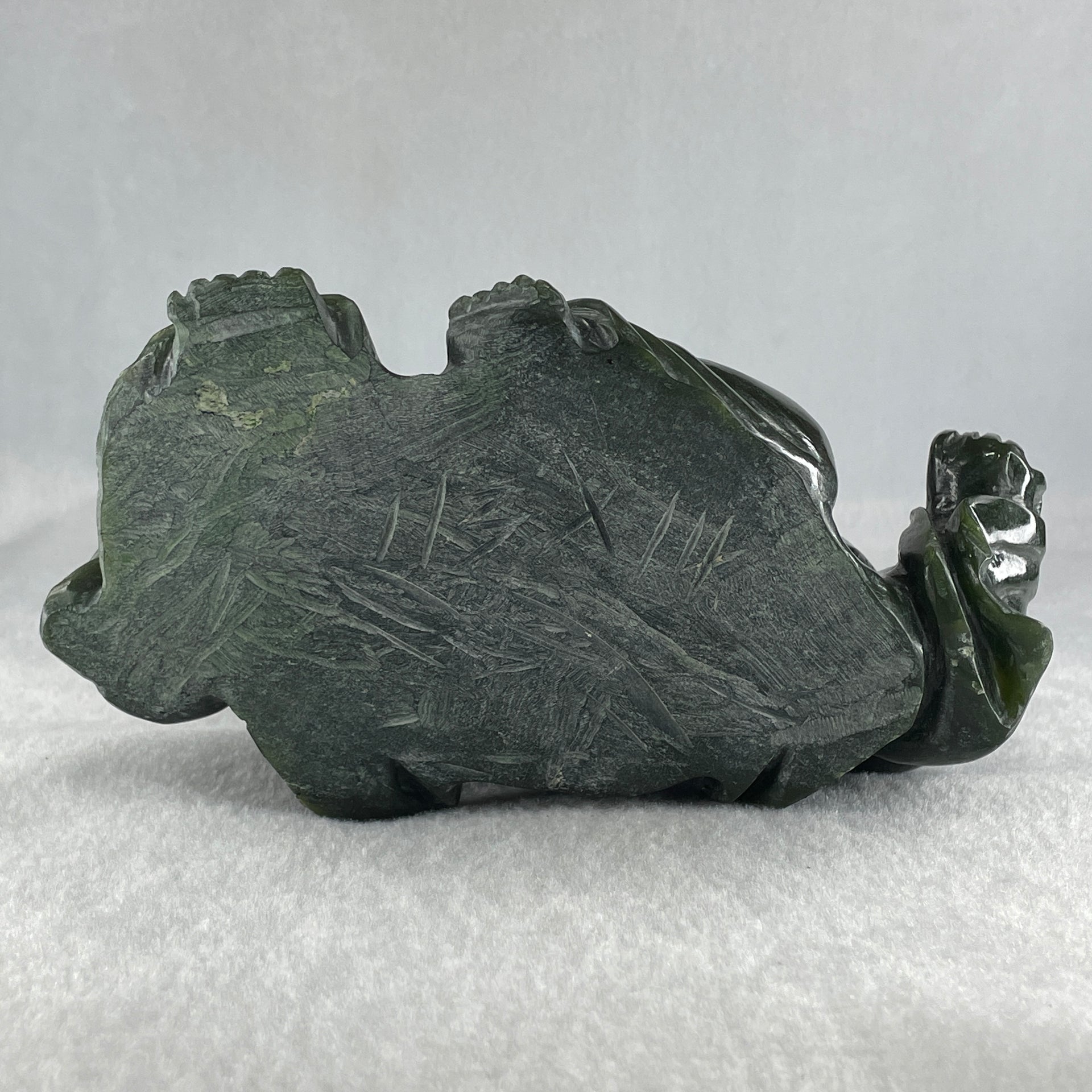 Natural Dark Green Serpentine Laughing Milo Buddha with Wealth Pot with Wooden Stand Display 1,656.6g 190.0 by 133.0 by 127.0mm - Huangs Jadeite and Jewelry Pte Ltd