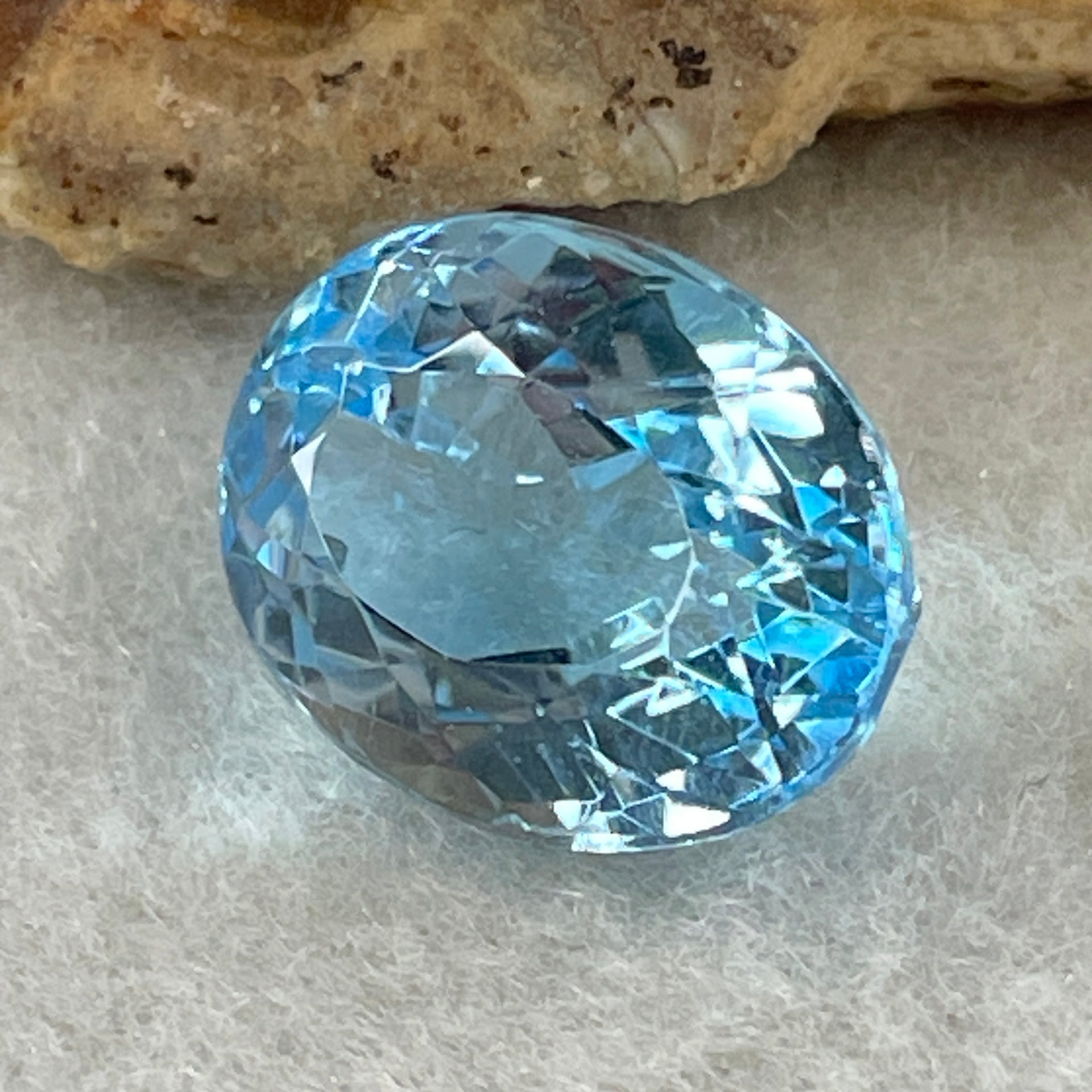 Natural Sky Blue Topaz Oval Shape 11.63ct 14.5 by 11.3 by 8.4mm - Huangs Jadeite and Jewelry Pte Ltd