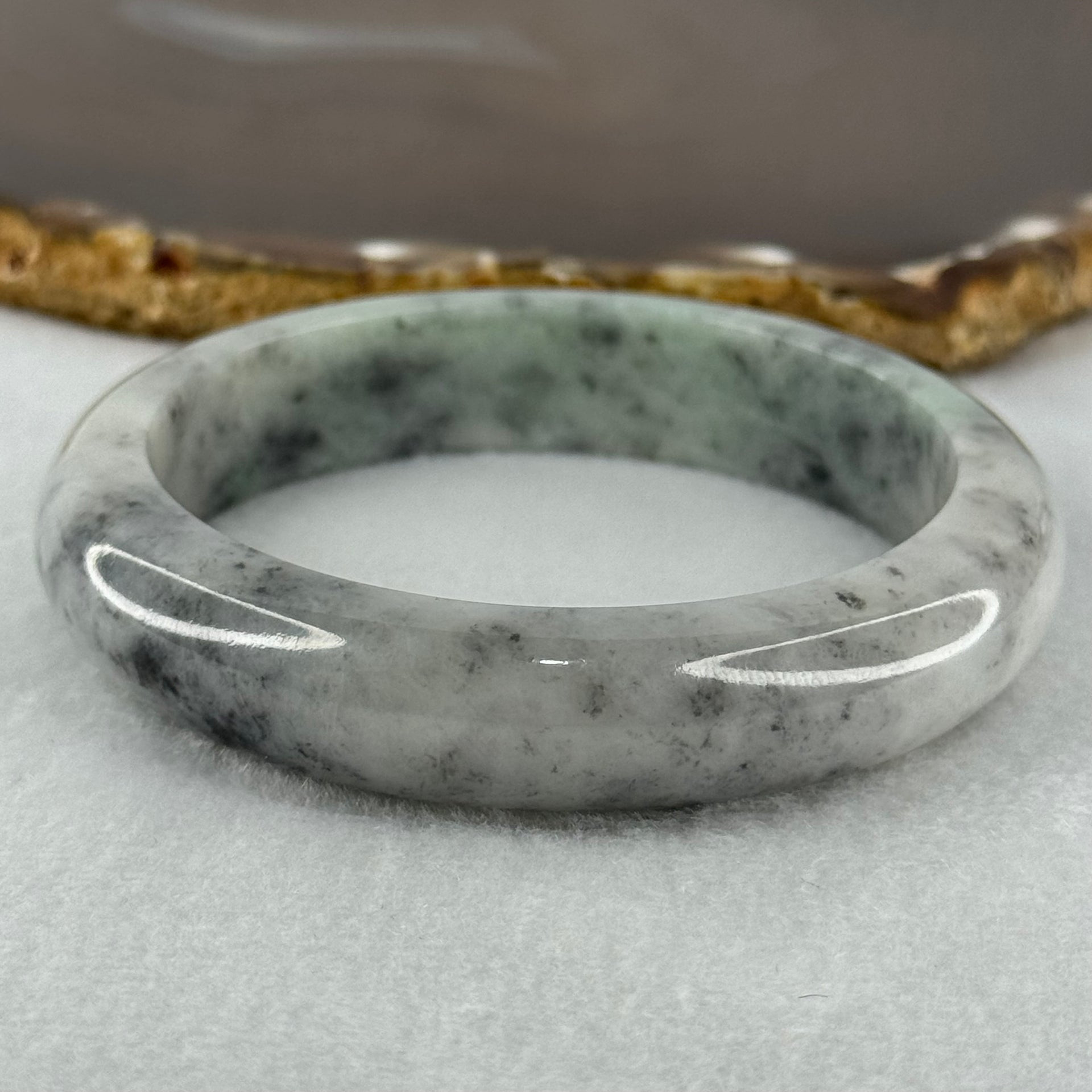Type A Faint Green and Black Piao Hua Jadeite Bangle Internal Diameter 57.2mm 65.08g 13.4 by 8.7mm (Very Slight Internal Lines) - Huangs Jadeite and Jewelry Pte Ltd
