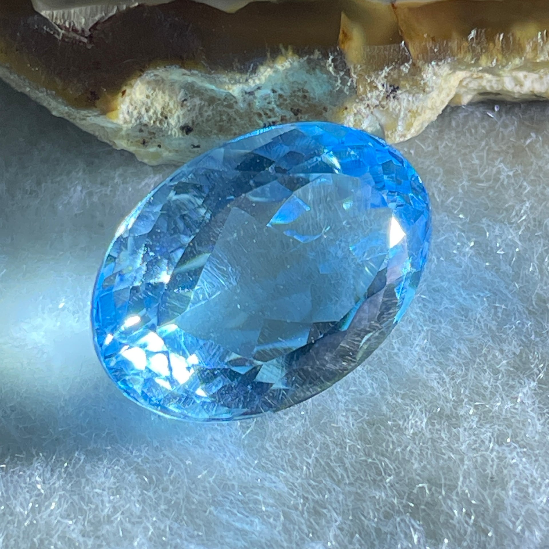 Natural Sky Blue Topaz Oval Shape 15.89ct 18.0 by 12.4 by 8.1mm - Huangs Jadeite and Jewelry Pte Ltd