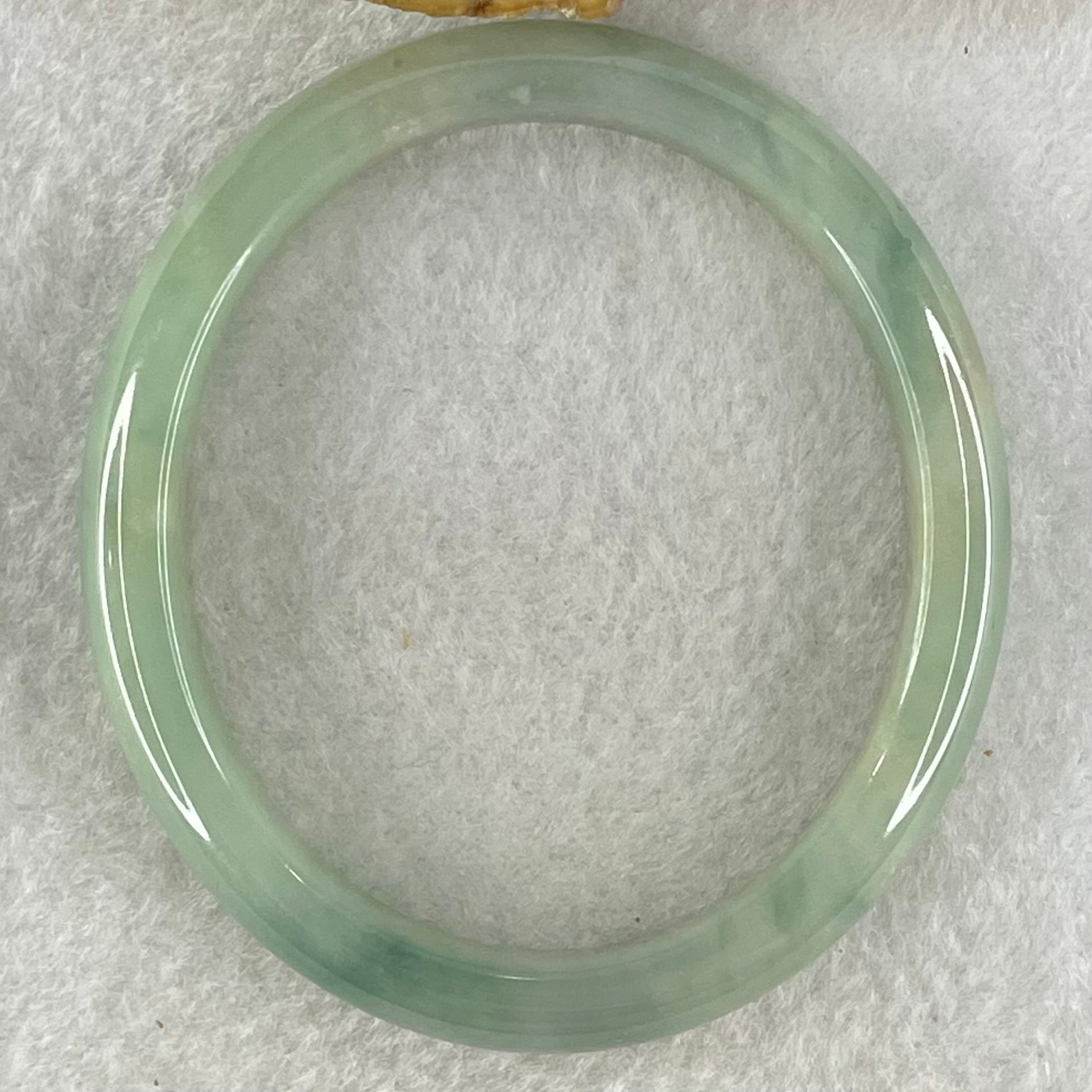 Type A Jelly Green Jadeite Oval Bangle 32.70g Internal Diameter 54.6mm 10.2 by 6.4mm (Close to Perfect) - Huangs Jadeite and Jewelry Pte Ltd