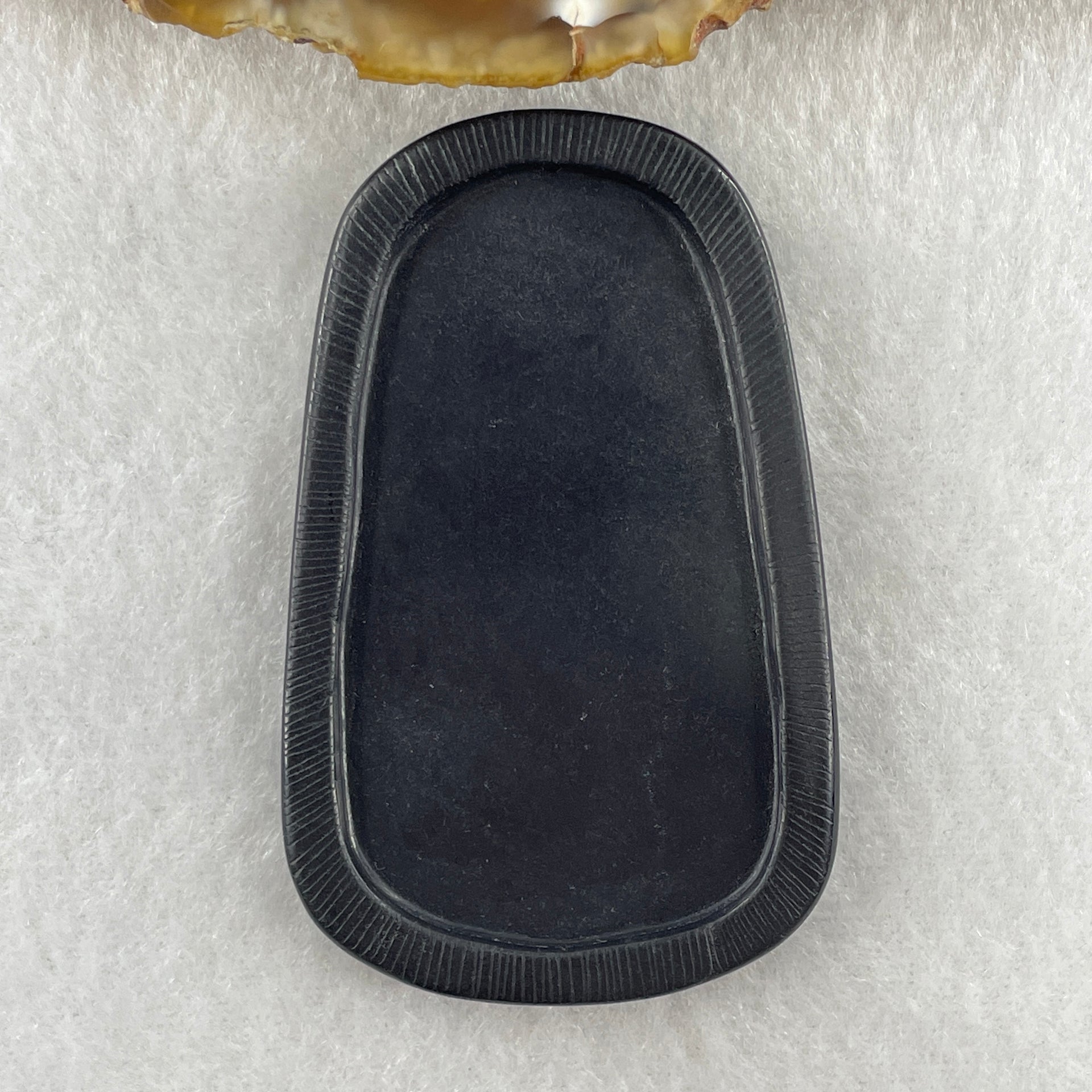 Type A Opaque to Partial Translucent Black Omphacite Jadeite Milo Laughing Buddha Pendant 22.86g 64.6 by 40.5 by 8.7mm - Huangs Jadeite and Jewelry Pte Ltd