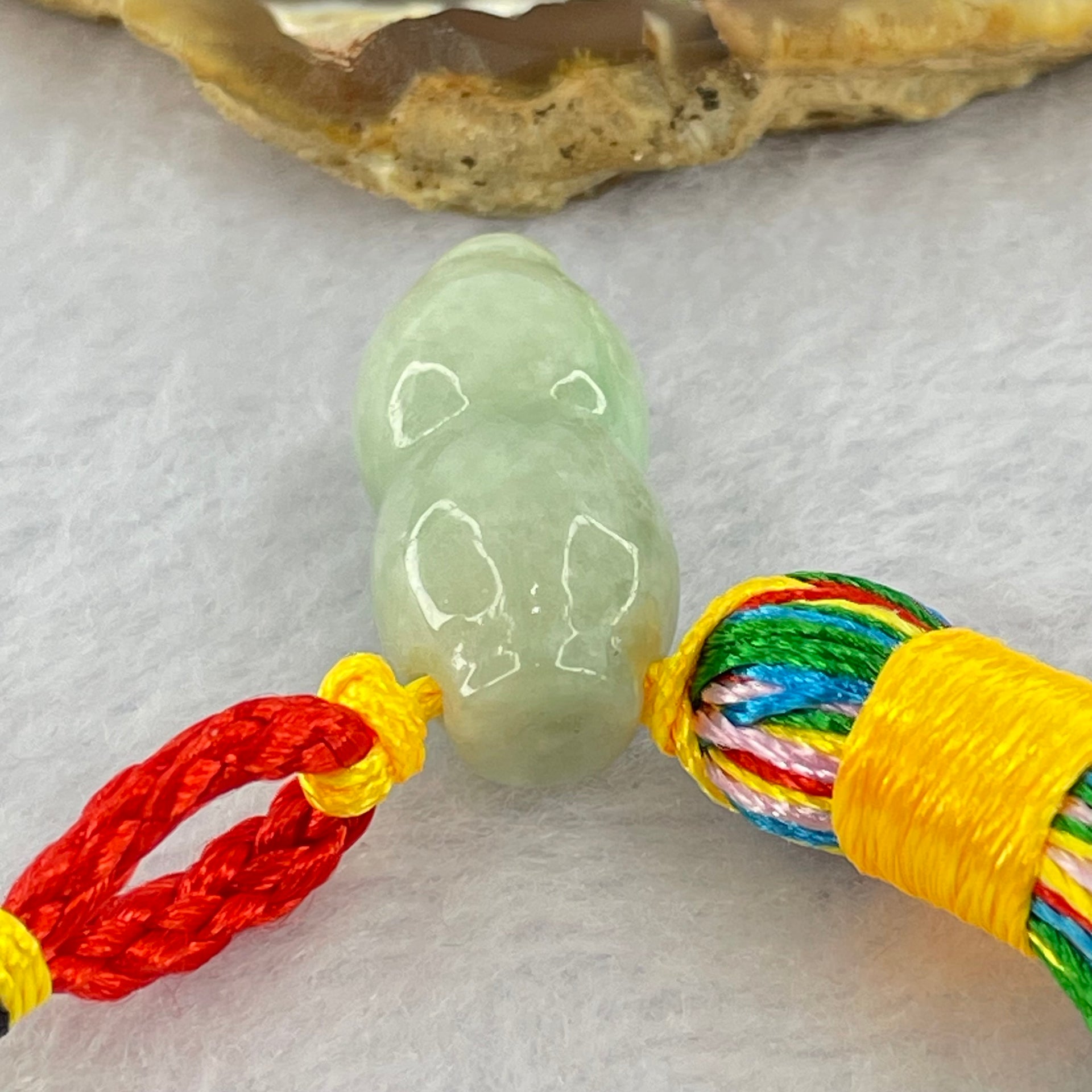 Type A Green Jadeite Peanut Charm Display 10.72g 24.4 by 11.5 by 11.3mm - Huangs Jadeite and Jewelry Pte Ltd