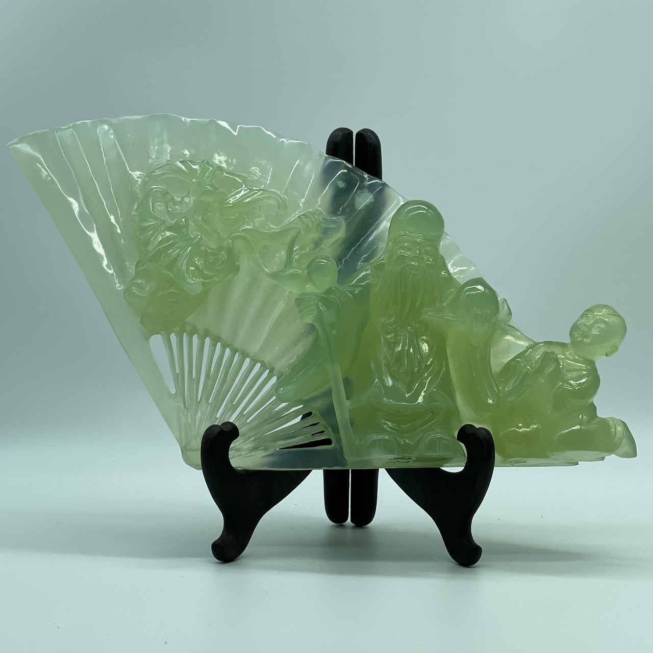 Natural Semi Icy Green Serpentine Shou Xing Gong with Tong Zi and Double Bat on Fan with Wooden Stand Display 1,465.5g 291.0 by 100.0 by 212.0mm