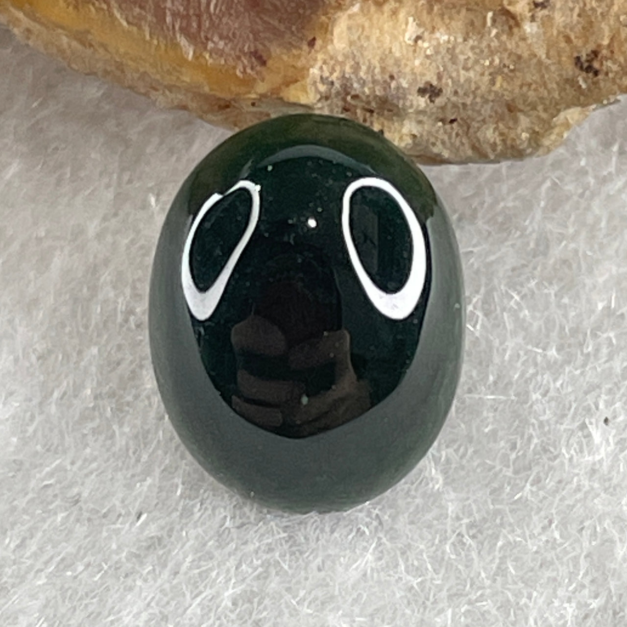 Type A Translucent Black Omphacite Jadeite Oval Cabouchon Stone For Setting 0.63g 10.0 by 8.1 by 3.8mm - Huangs Jadeite and Jewelry Pte Ltd