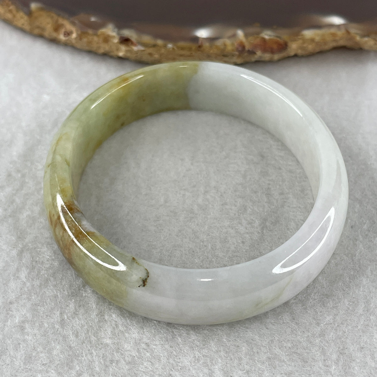 Natural Type Light Lavender with Yellowish Green Jadeite Oval Bangle 37.93g Inner Diameter 55.7mm 12.8 by 6.0mm (Slight External Rough) - Huangs Jadeite and Jewelry Pte Ltd