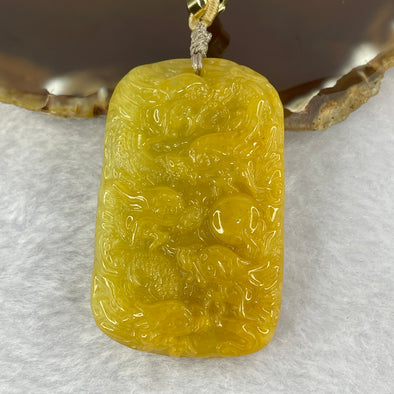 Certified Type A Yellow Jadeite 9 Dragons 九龙 Pendent 47.20g by 51.7 by 32.9 by 12.4 mm - Huangs Jadeite and Jewelry Pte Ltd