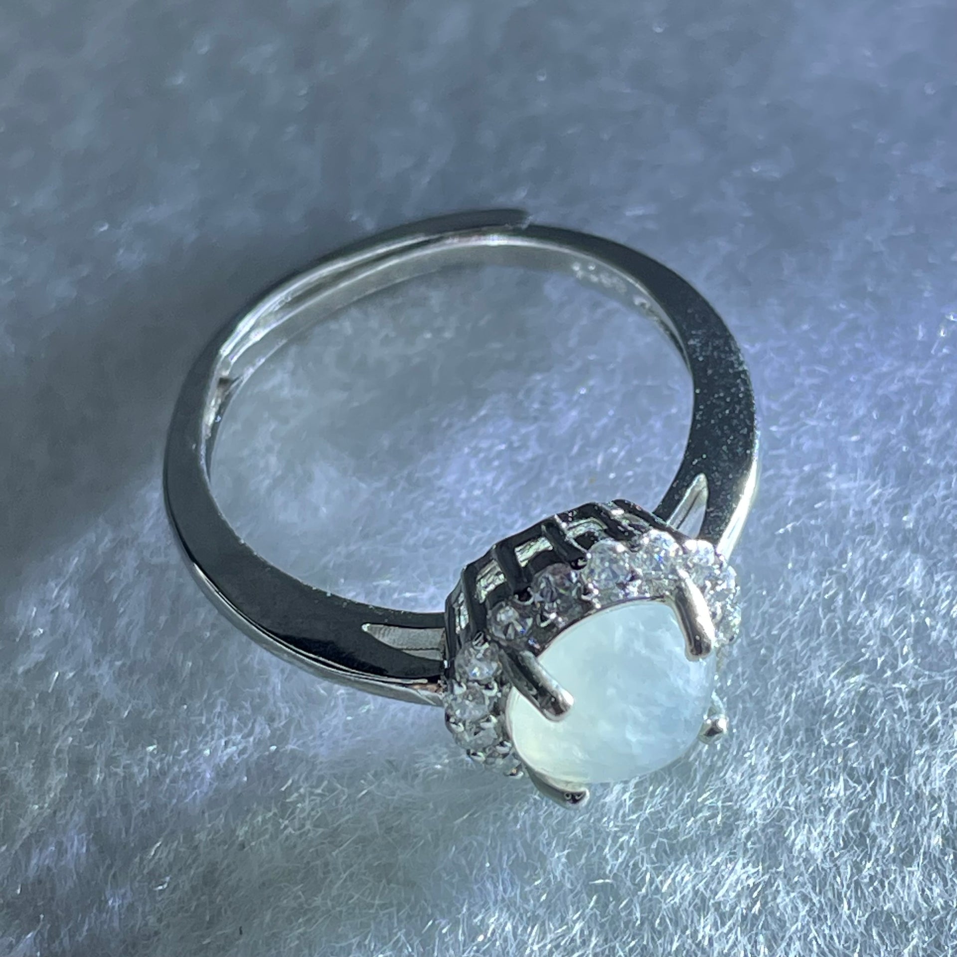 Type A Semi Icy Faint Green Jadeite Cabochon in S925 Sliver Ring (Adjustable Size) 2.04g 6.5 by 4.0mm - Huangs Jadeite and Jewelry Pte Ltd