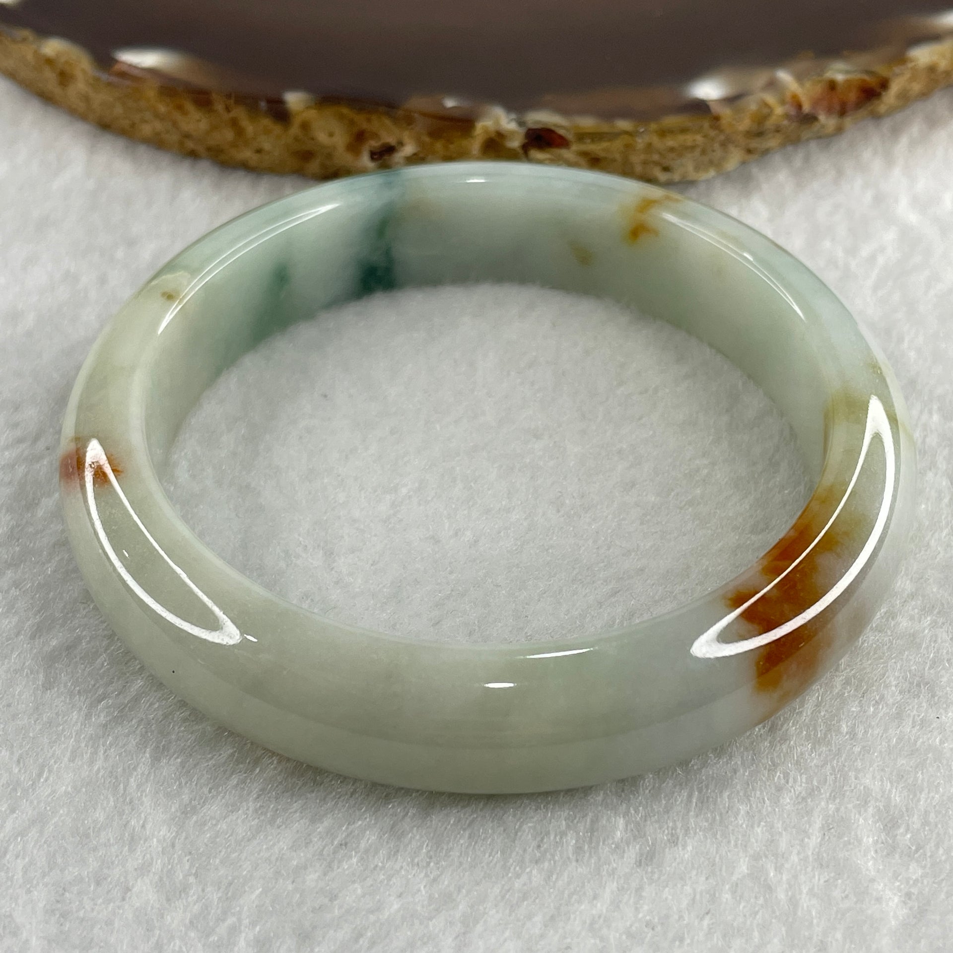 Type A Natural Light Green with Spicy Green and Brownish Patches Jadeite Bangle 55.09g Inner Diameter 57.5mm 12.7 by 9.0mm (Slight External Rough) - Huangs Jadeite and Jewelry Pte Ltd