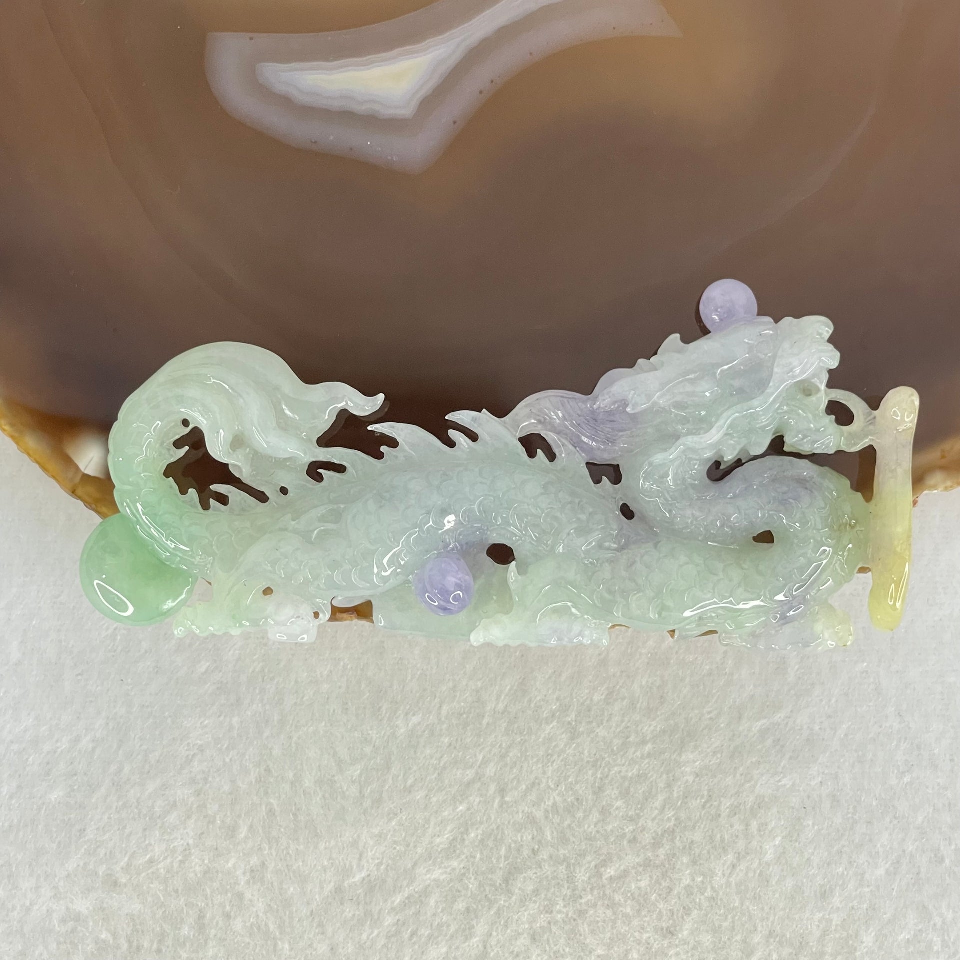 Type A Light Green with Deep Bright Lavender and Yellow Jadeite Pendant 45.66g 8.3 by 3.9 by 11mm with Wooden Stand - Huangs Jadeite and Jewelry Pte Ltd