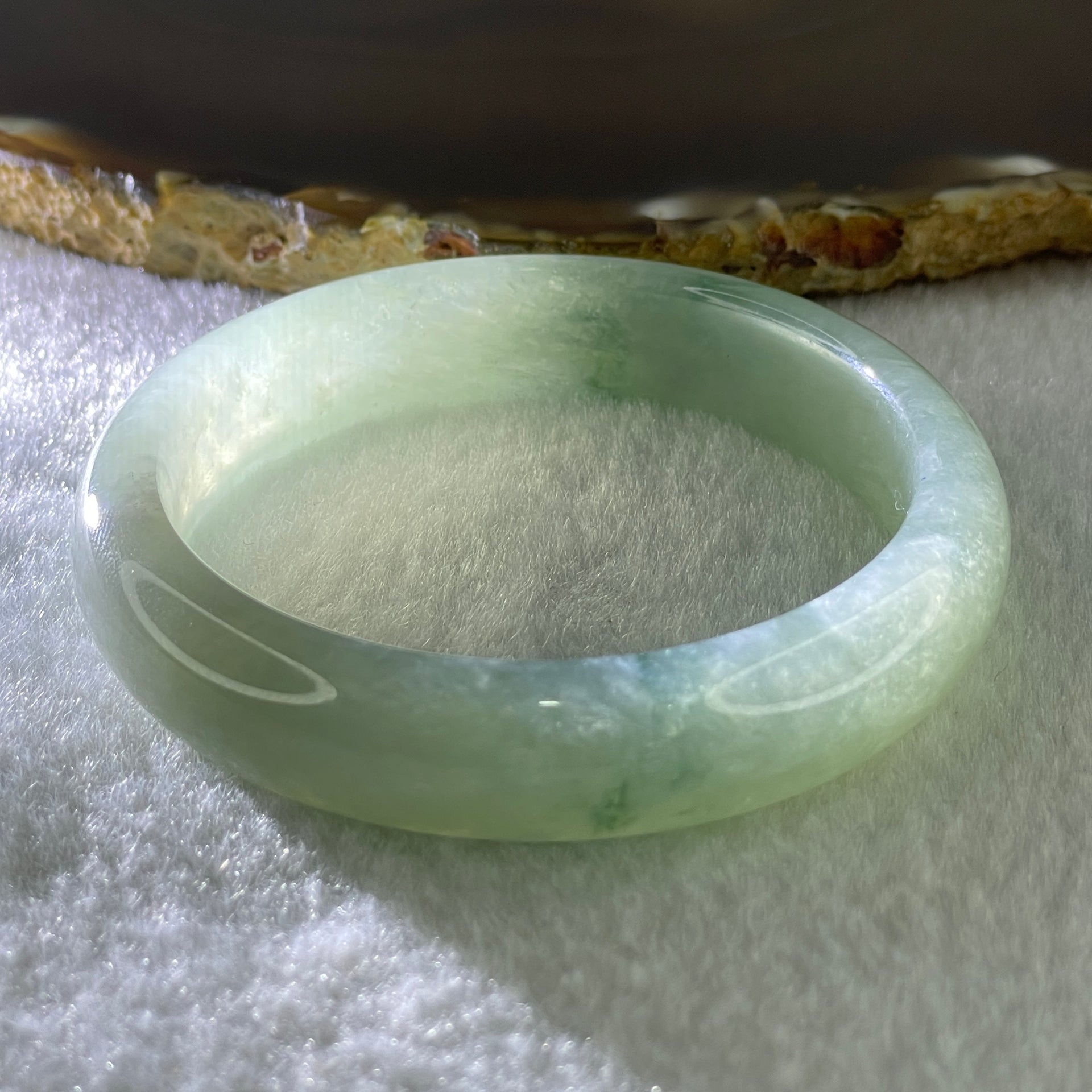 Type A Natural Jelly Semi Icy Light Green with Blueish Green Flora Piao Hua Jadeite Bangle 47.66g Inner Diameter 52.4mm 12.6 by 8.5mm (Internal Lines) - Huangs Jadeite and Jewelry Pte Ltd