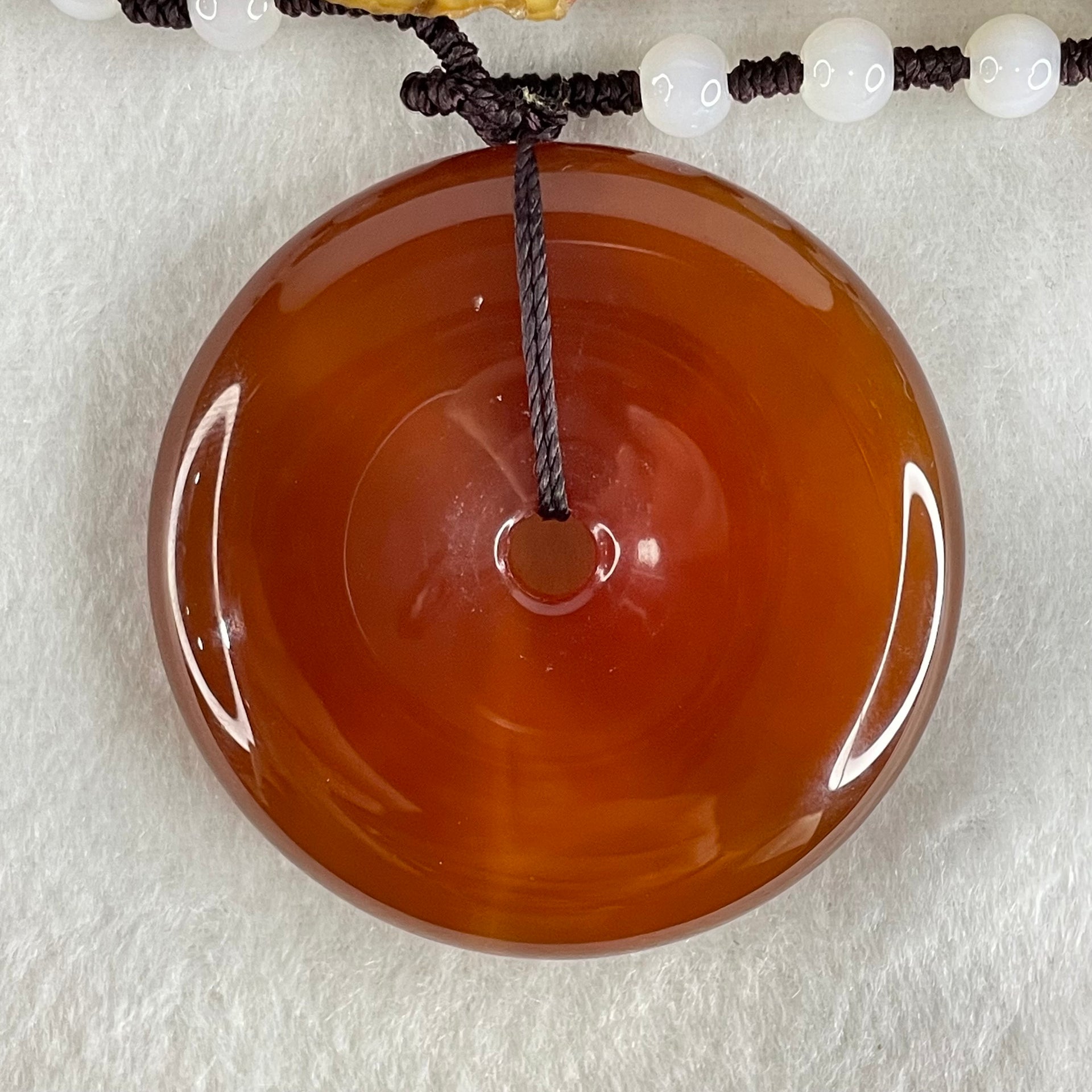 Natural Red Chalcedony Ping An Kou Donut 55.771g 52.6 by 11.2mm with White Crystal Beads Necklace 60cm - Huangs Jadeite and Jewelry Pte Ltd