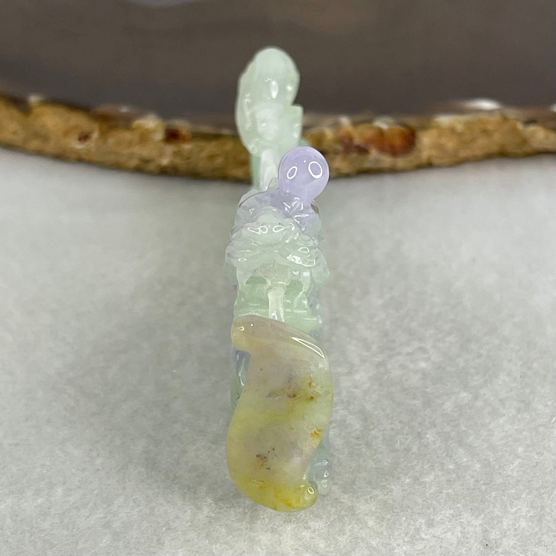 Type A Light Green with Deep Bright Lavender and Yellow Jadeite Pendant 45.66g 8.3 by 3.9 by 11mm with Wooden Stand - Huangs Jadeite and Jewelry Pte Ltd