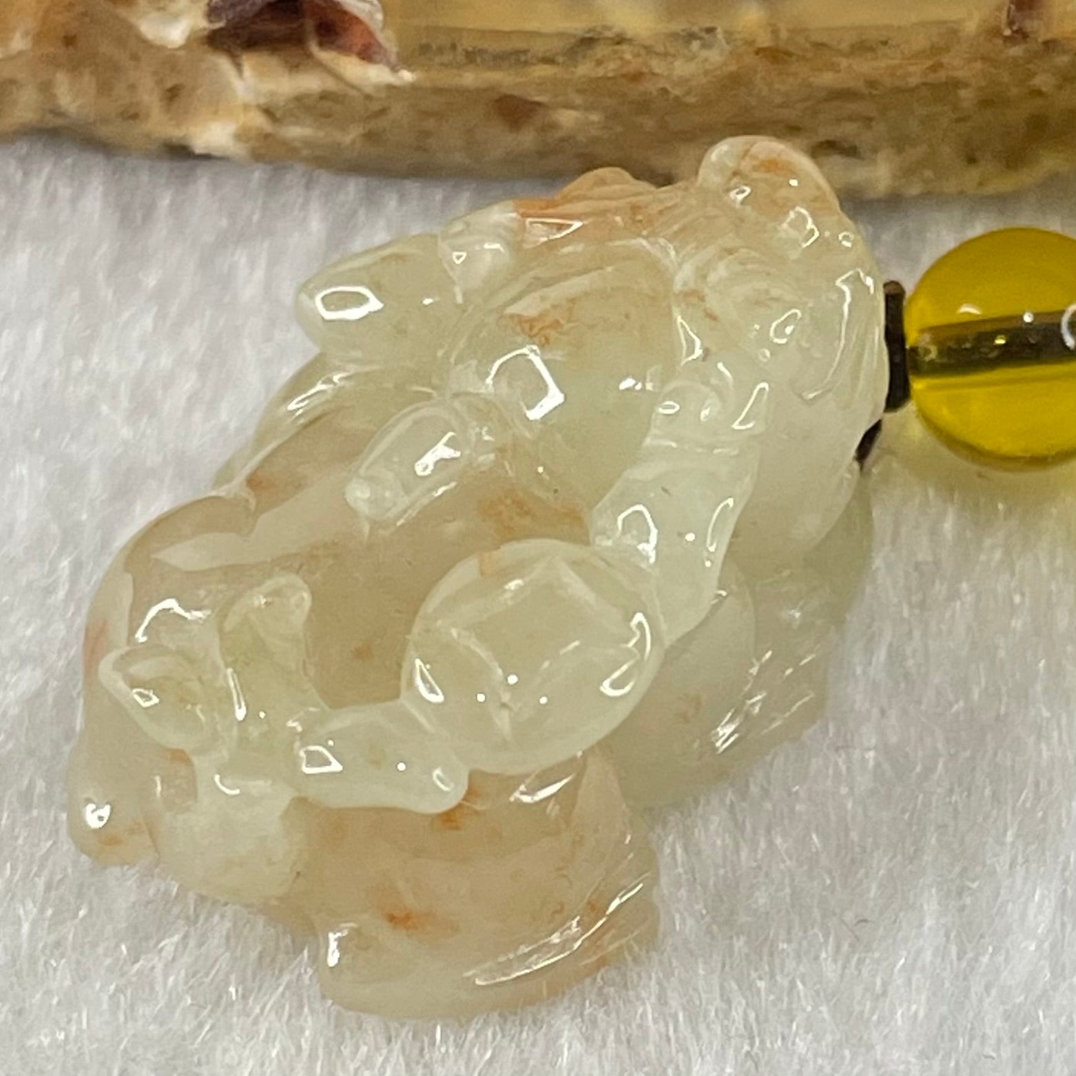 Type A Faint Yellow with Reddish Brown Spots Jadeite Male Pixiu Charm 8.27g 22.5 by 16 by 12.2mm - Huangs Jadeite and Jewelry Pte Ltd