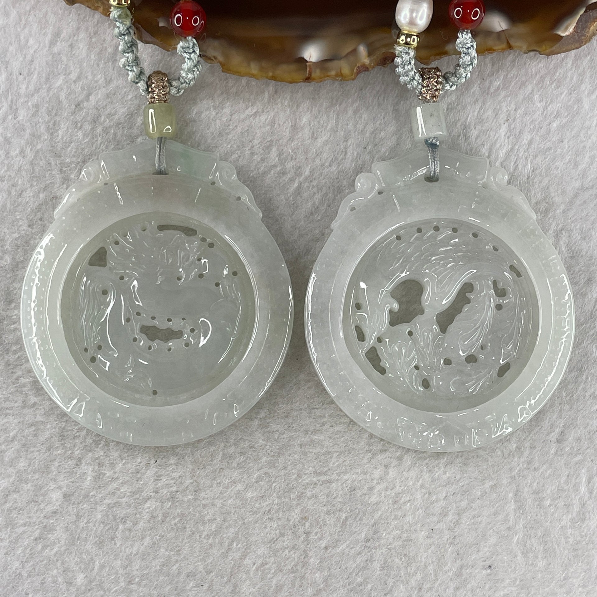 Grand Master Natural Colorless to Fain Green Jadeite Dragon and Phoenix Pendant 60.88g 54.8 by 47.9 by 6.0mm - Huangs Jadeite and Jewelry Pte Ltd