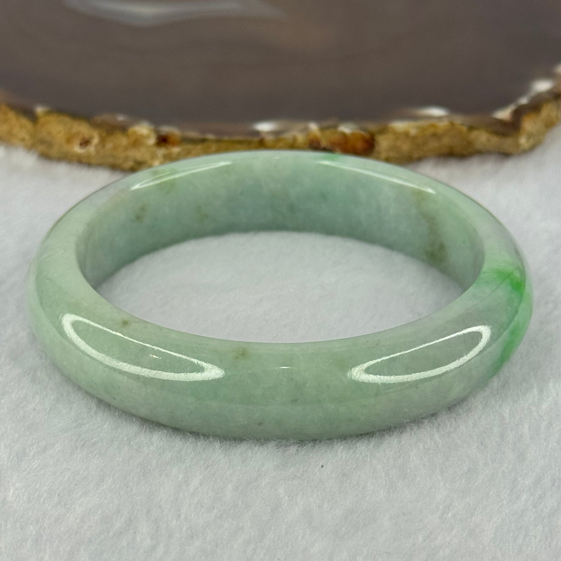 Type A Light Green with Bright Green Patches Jadeite Bangle 78.00g Internal Diameter 61.7mm 14.5 by 9.9mm (Very Slight External Rough) - Huangs Jadeite and Jewelry Pte Ltd
