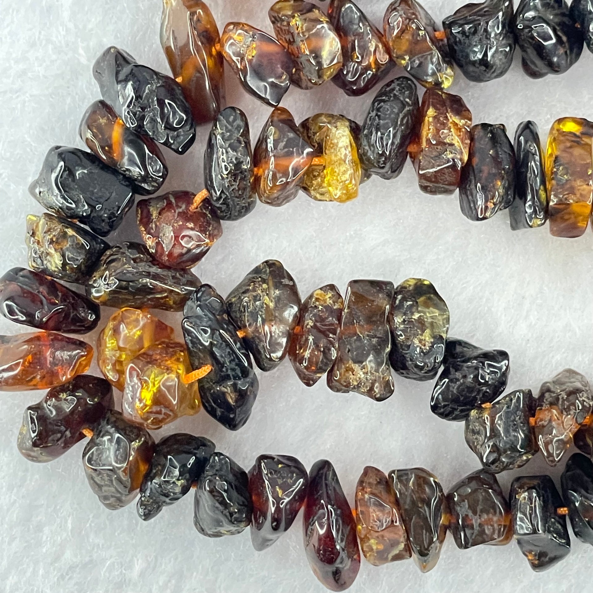 Natural Cognac Amber Beads Irregular Bracelet 34.60g 70cm 14.1 by 8.5 by 5.9mm to 7.8 by 7.1 by 4.9mm 139 Beads - Huangs Jadeite and Jewelry Pte Ltd